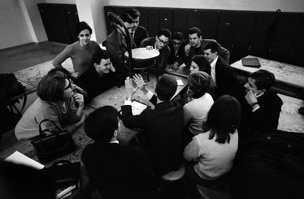 Young university students discussing a student assembly faculty of- Old Photo 1 Young university students discussing a student assembly faculty of- Old Photo 1
