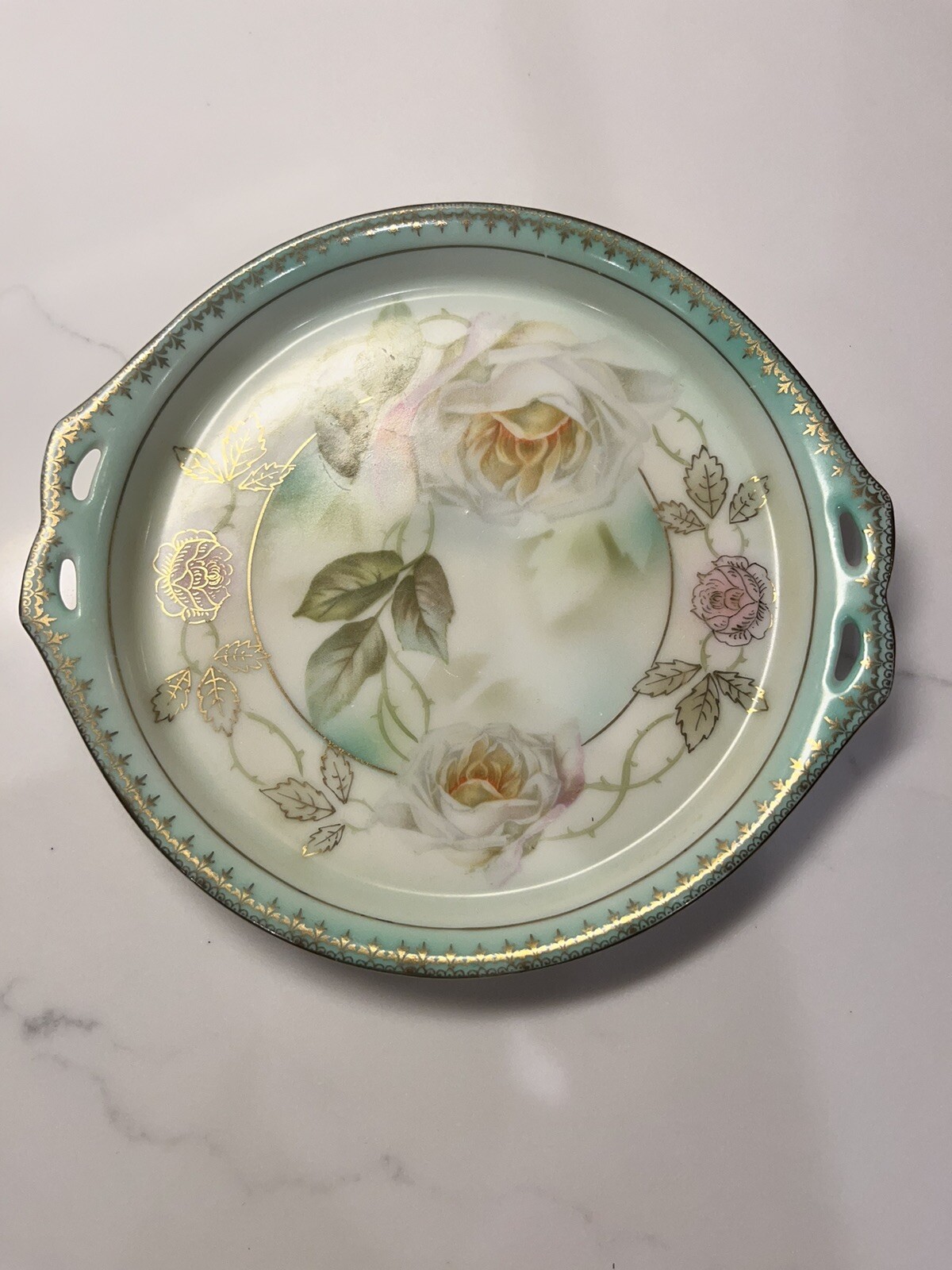 Prussia two handled Hand Painted floral dish,  6”