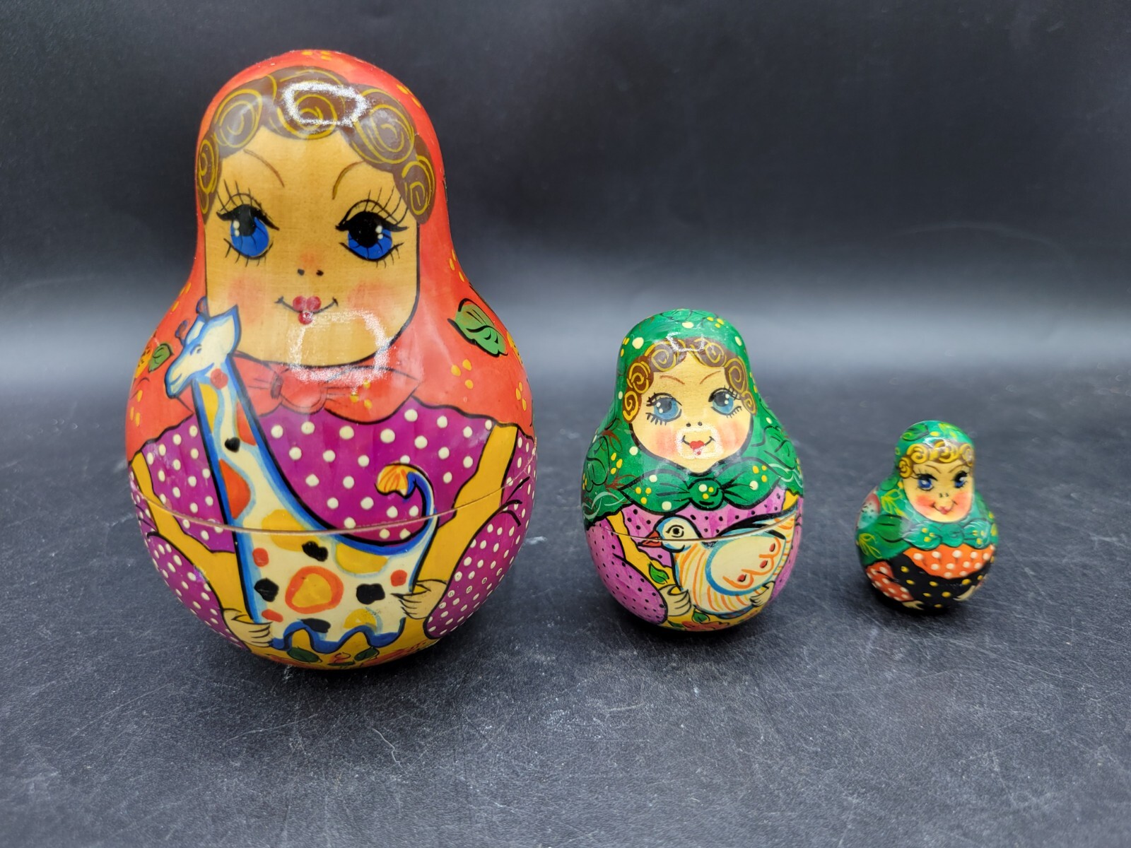 Russian Matryoshka Style Roly Poly Hand Painted Wooden Nesting Dolls Russian Matryoshka Style Roly Poly Hand Painted Wooden Nesting Dolls