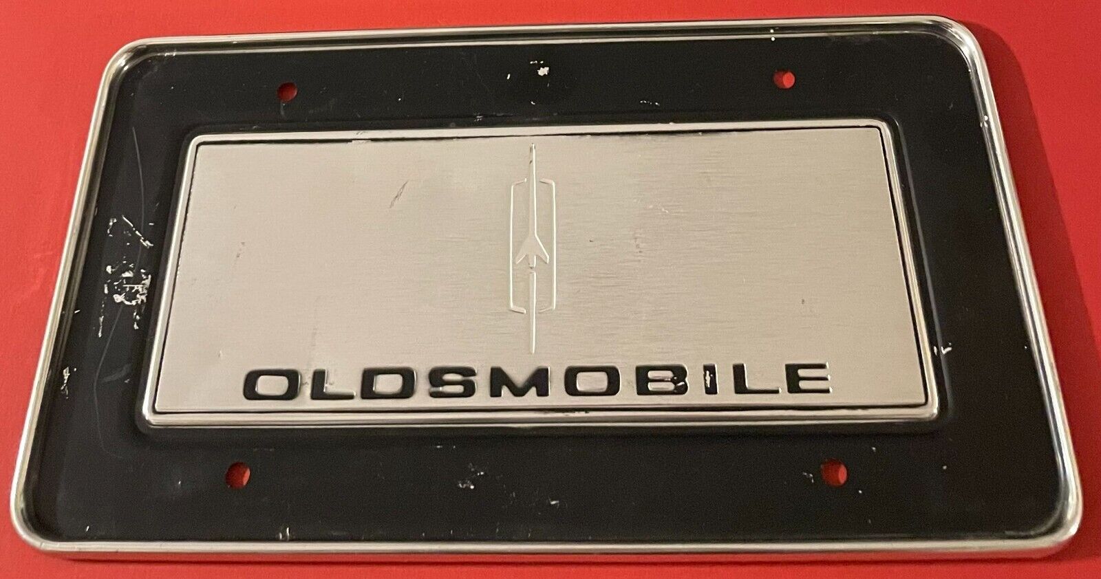 Vintage Oldsmobile Booster License Plate Rocket Logo Classic Cutlass 442 Olds