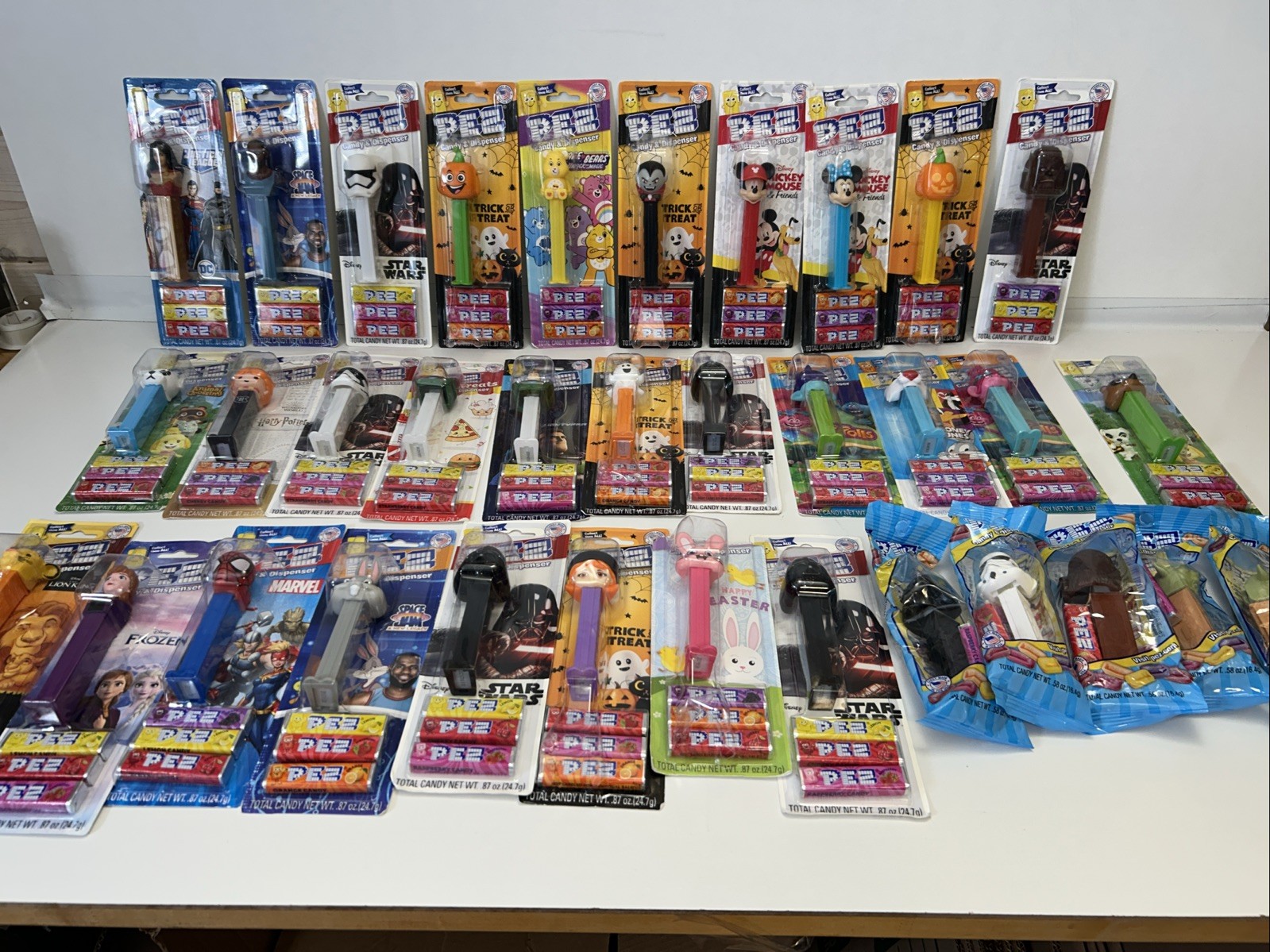 Lot of PEZ Dispensers. 35 Total. Still In Packaging New. Never Used EXP. 7/27