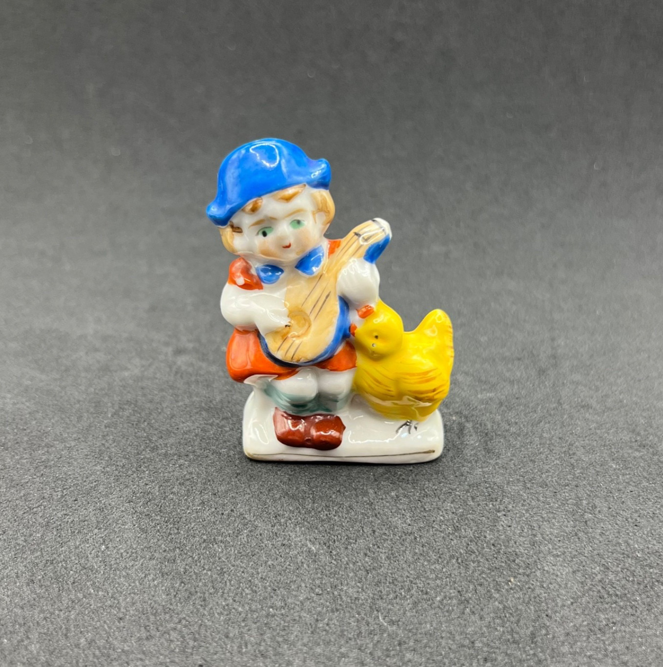 Vintage Occupied Japan Porcelain Boy Playing Mandolin Chicken Figurine