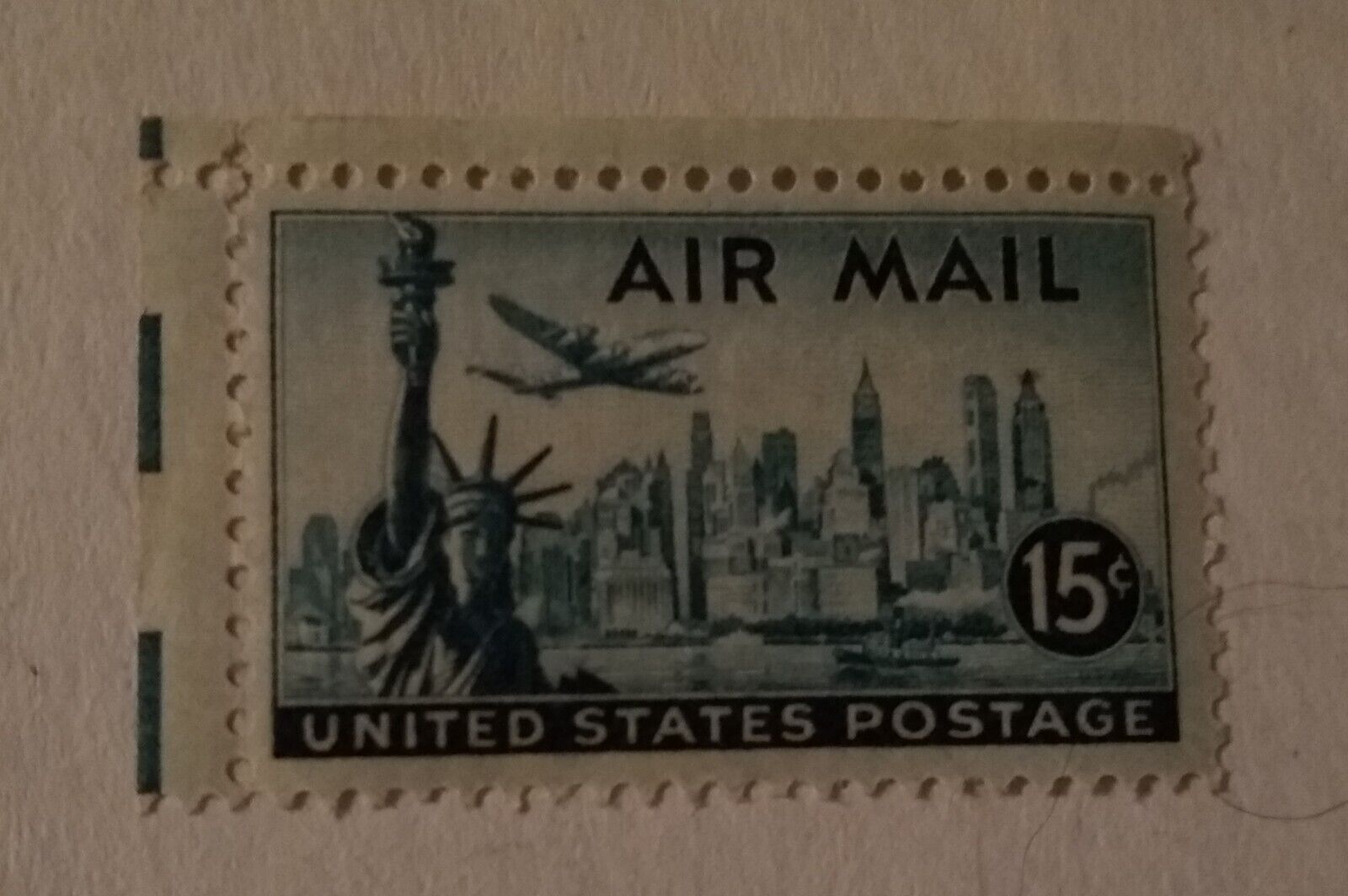 Get your hands on this vintage United States Air Mail Stamp in green