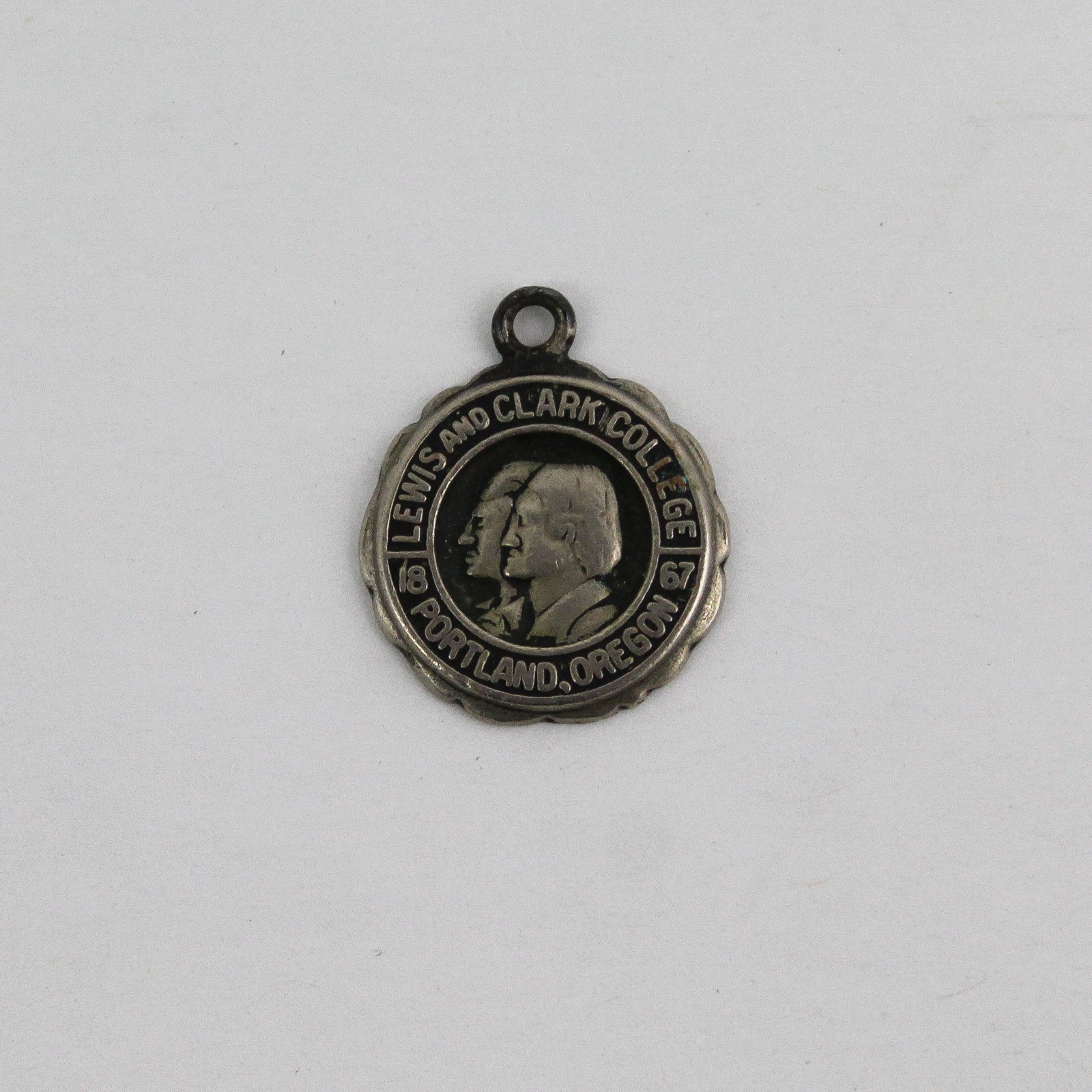 Vintage Lewis & Clark College 1967 Silver Figural Charm Pendant