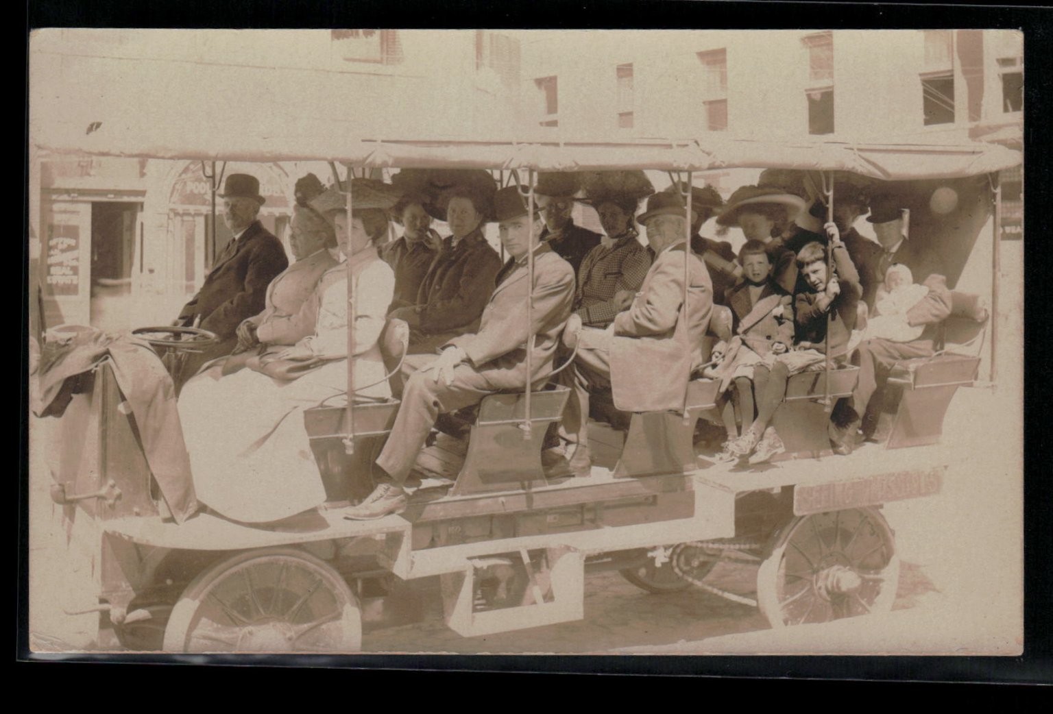 RPPC Early 1900s Large Tour Bus People Hats City Street Vintage Postcard