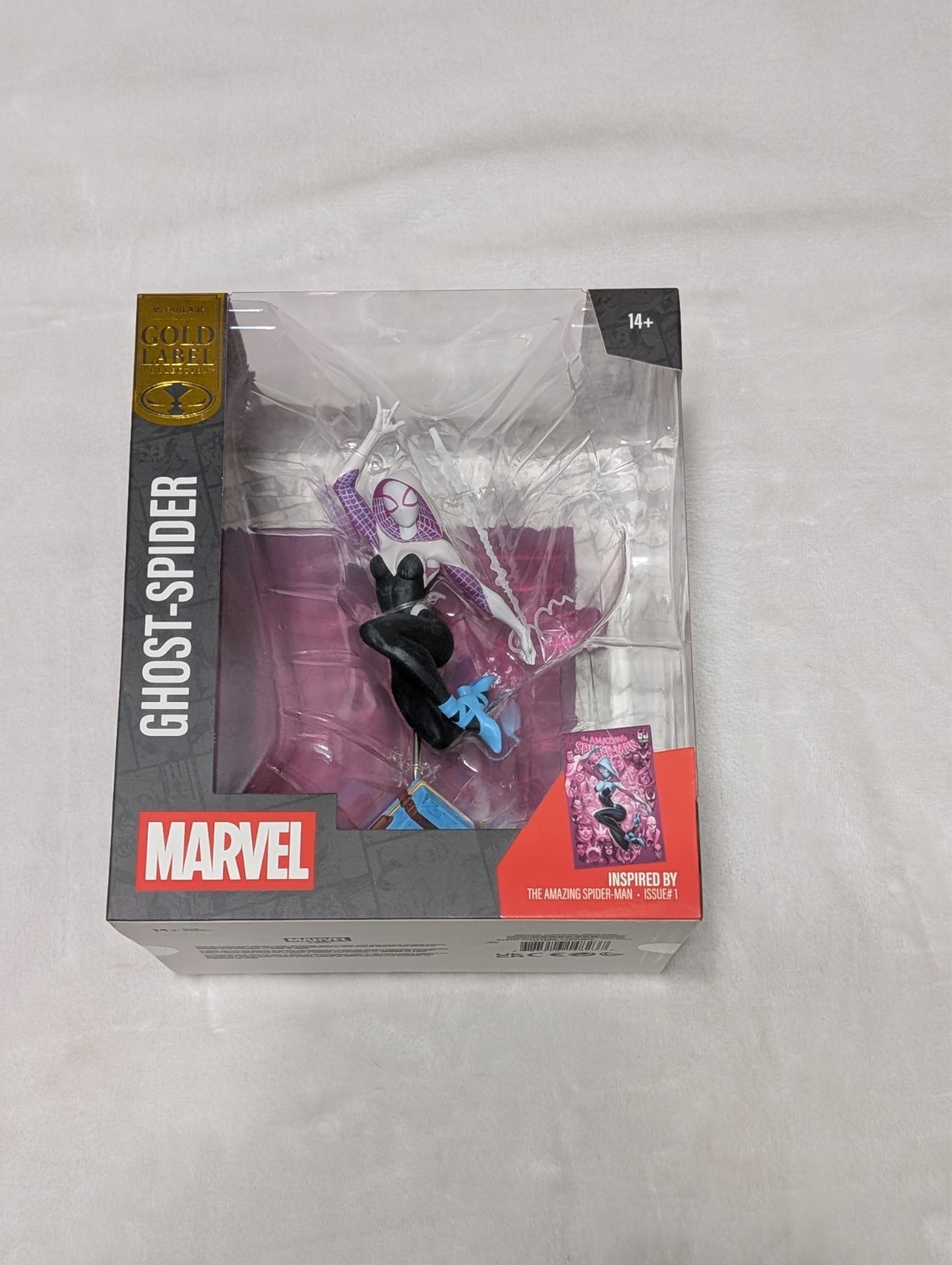 ghost spider figurine gold label