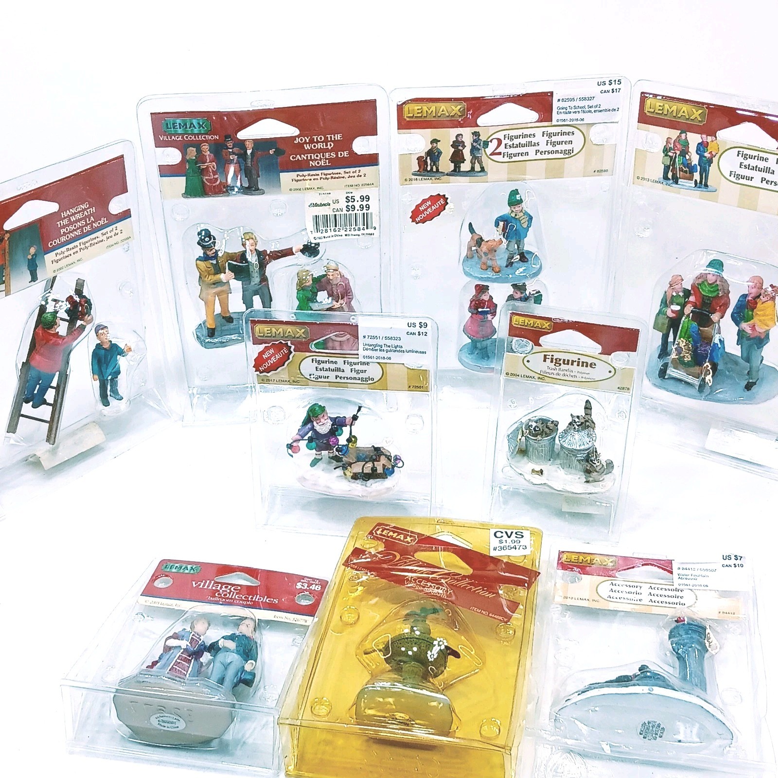 LOT OF 9 PACKS OF ASSORTED LEMAX VILLAGE CAROLE TOWNE FIGURINES NEW