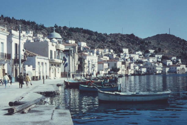 The waterfront at Poros a pair of islands in Greece circa 1960 Old Photo
