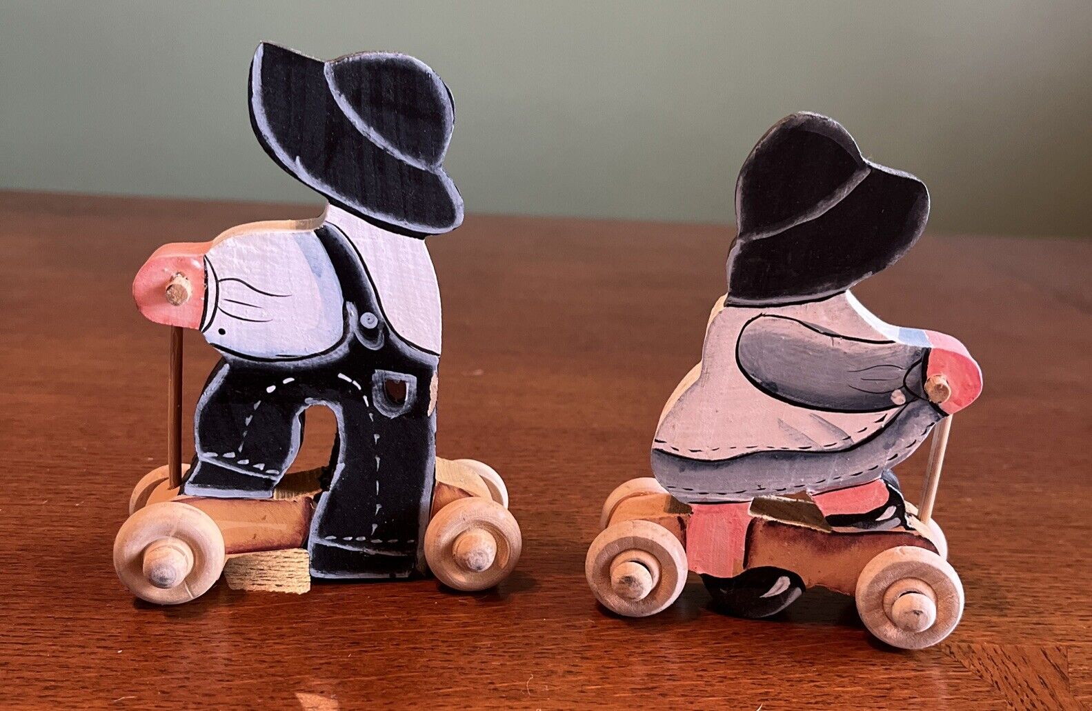 Vintage Wooden Amish Boy And Girl On Scooters Figurine Set