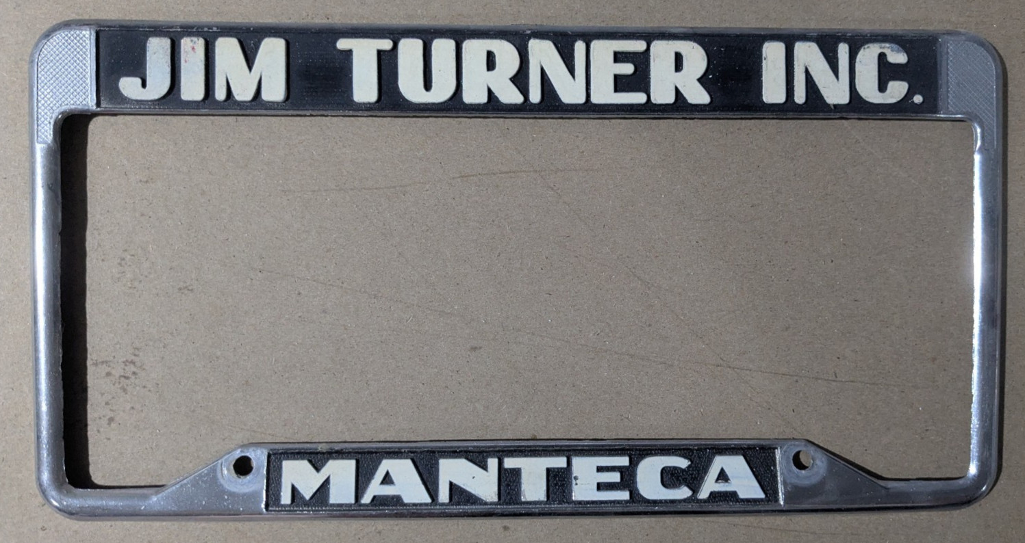 VTG Metal Jim Turner Inc Manteca Oldsmobile Pontiac Dealer License Plate Frame
