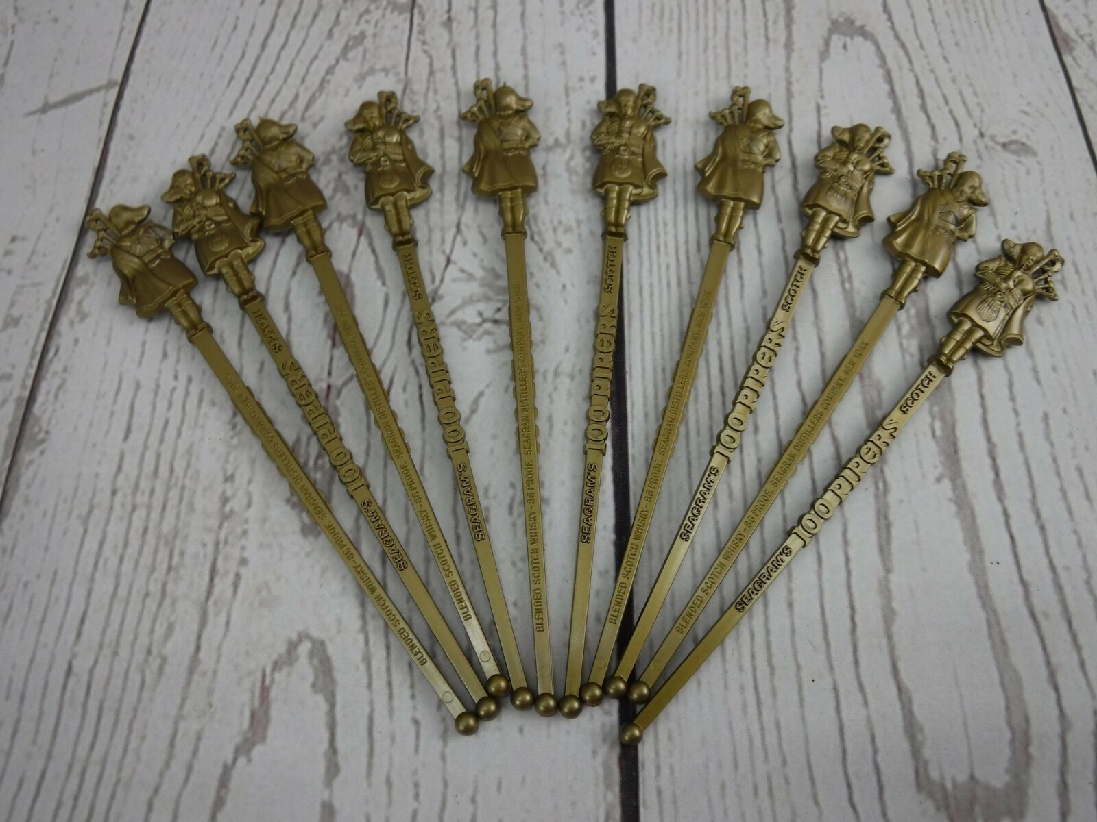 10 Seagram's Scotch Swizzles 100 Pipers Gold Uniformed Bagpiper Figure Swizzle