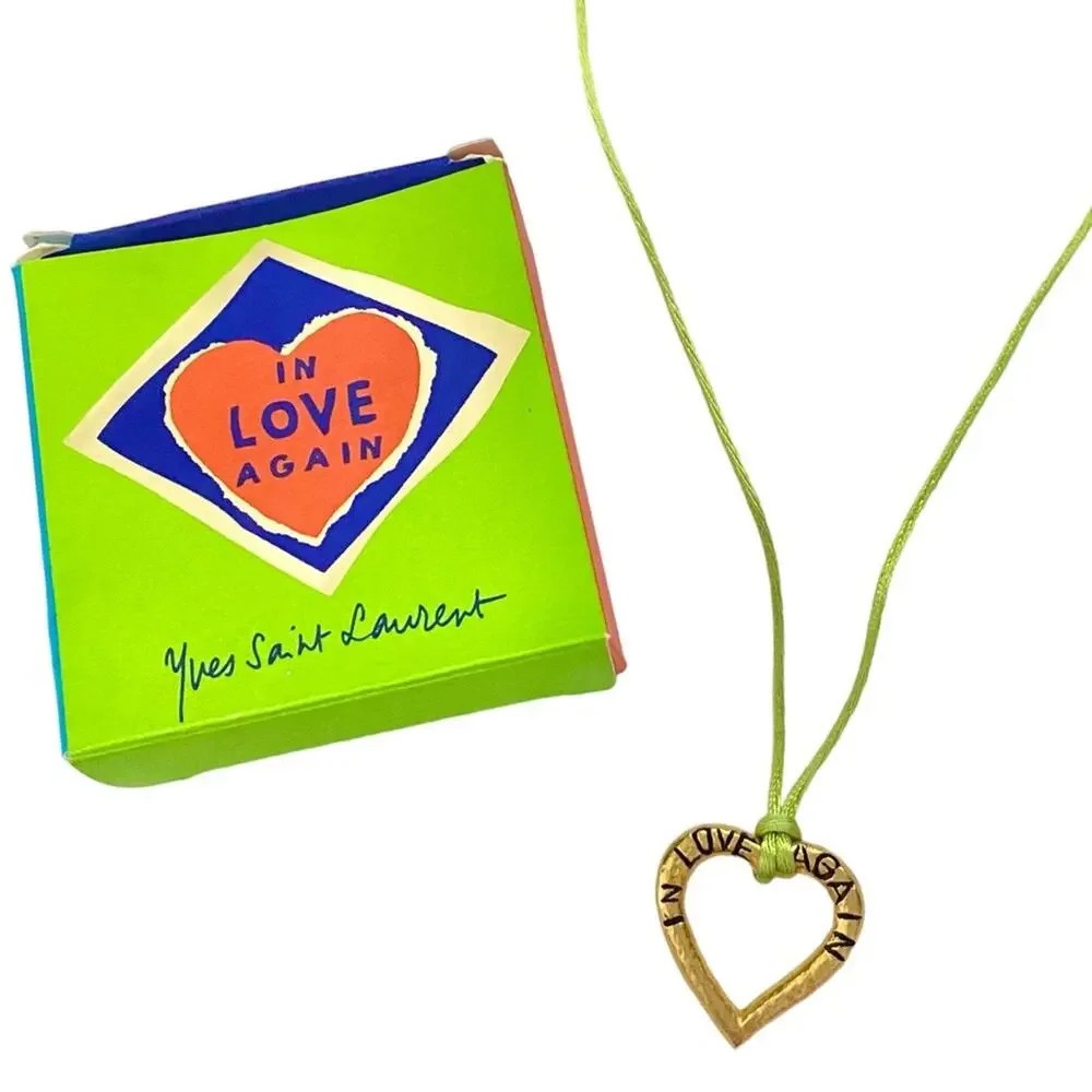 YVES SAINT LAURENT / YSL IN LOVE AGAIN GOLD HEART WITH LIME GREEN CORDED PENDANT