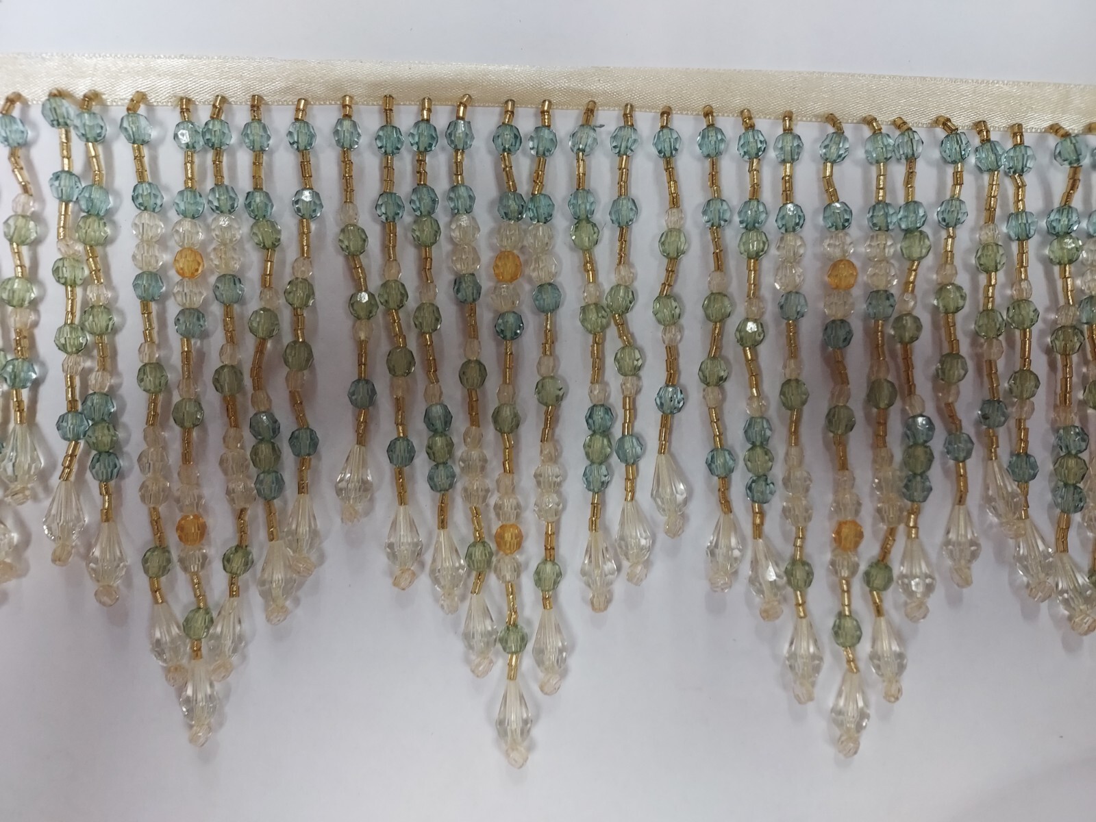long  beaded fringe 5 to 6 inches long