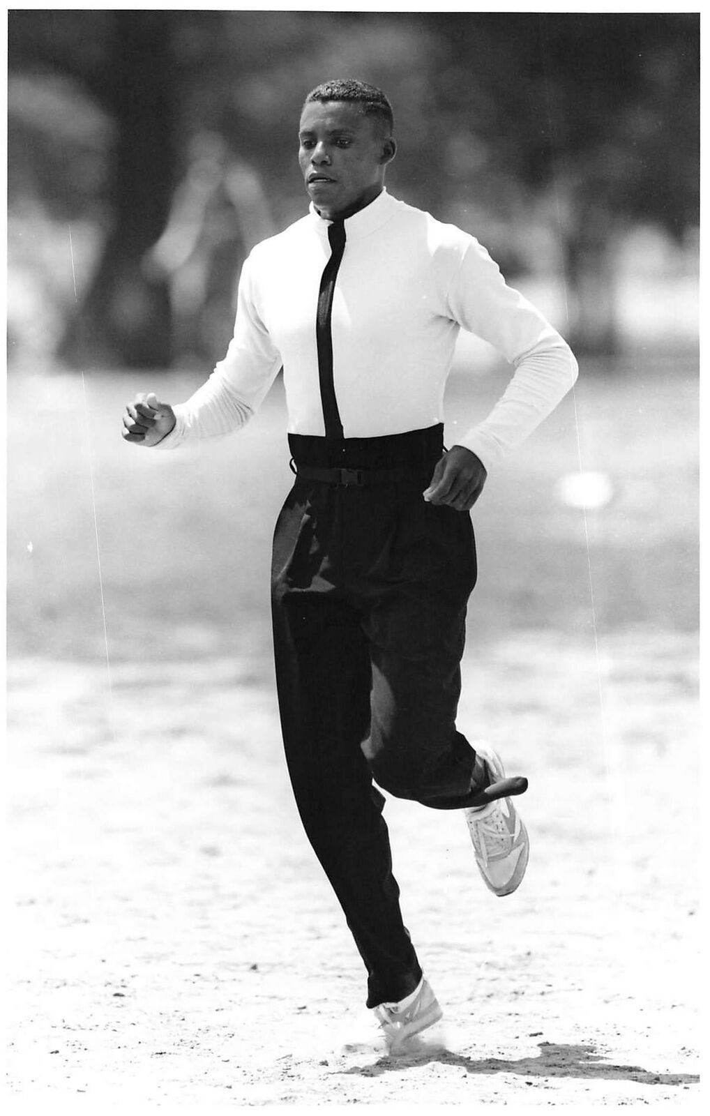 1991 Press Photo CARL LEWIS Santa Barbara Track Club Training Suit Long Jump Tux