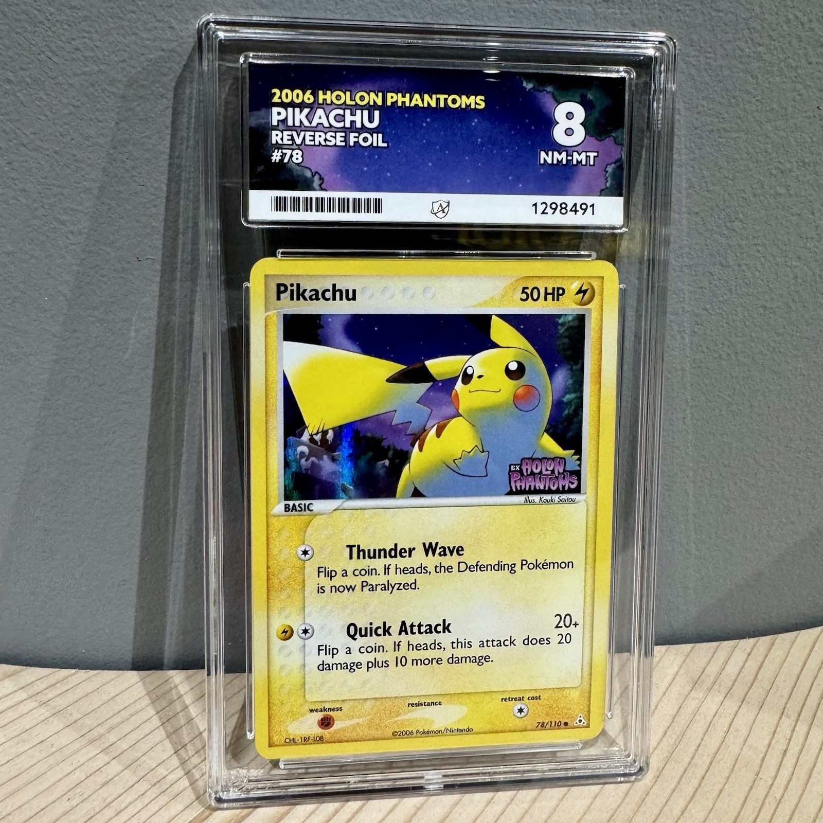 Pikachu Reverse Holo 2006 Stamped 78/110 Ex Holon Phantoms Pokemon PSA ACE 8