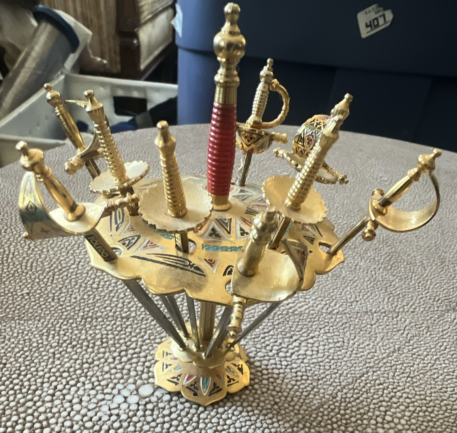 vintage Toledo sword cocktail pick set with stand, made in Spain as bar ware.