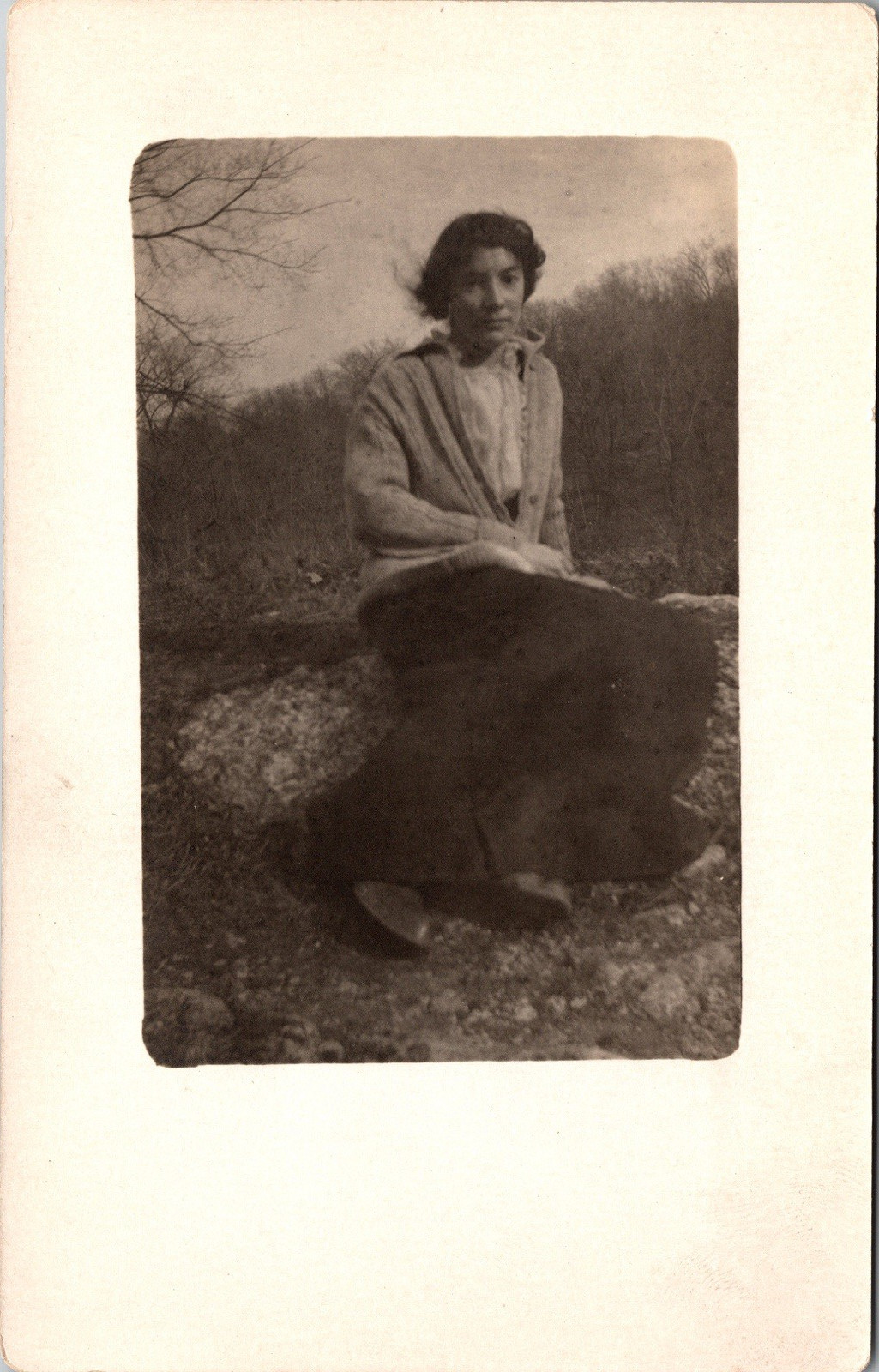 Postcard Real Photo RPPC Woman Sitting on Rock Wearing Sweater Unposted
