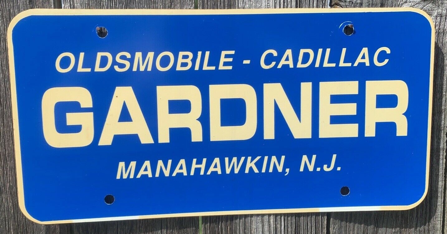 CADILLAC OLDSMOBILE DEALERSHIP LICENSE PLATE GARDNER MANAHAWKIN, NEW JERSEY