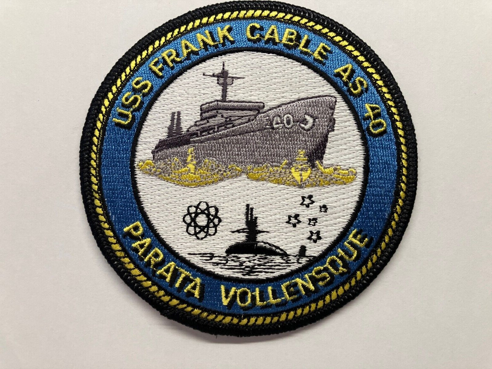 Ship\'s crest patch of USS FRANK CABLE (AS-40)