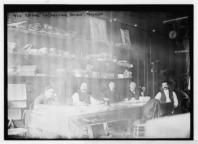 Photo:Paterson N.J. Editors of La Questione Sociale at Table 1900s