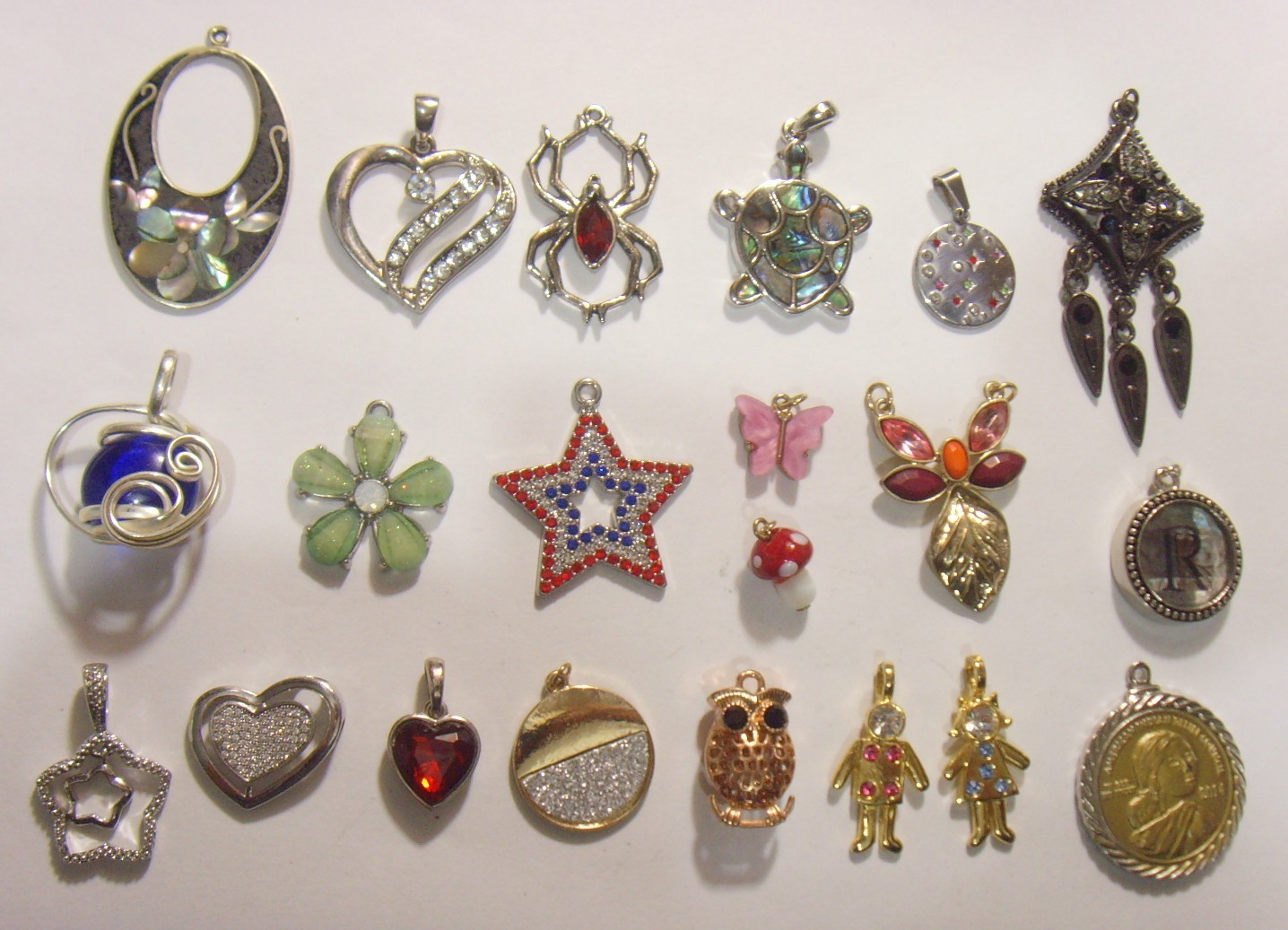 21 vintage assorted religious native American motif jewelry pendants lot 55208