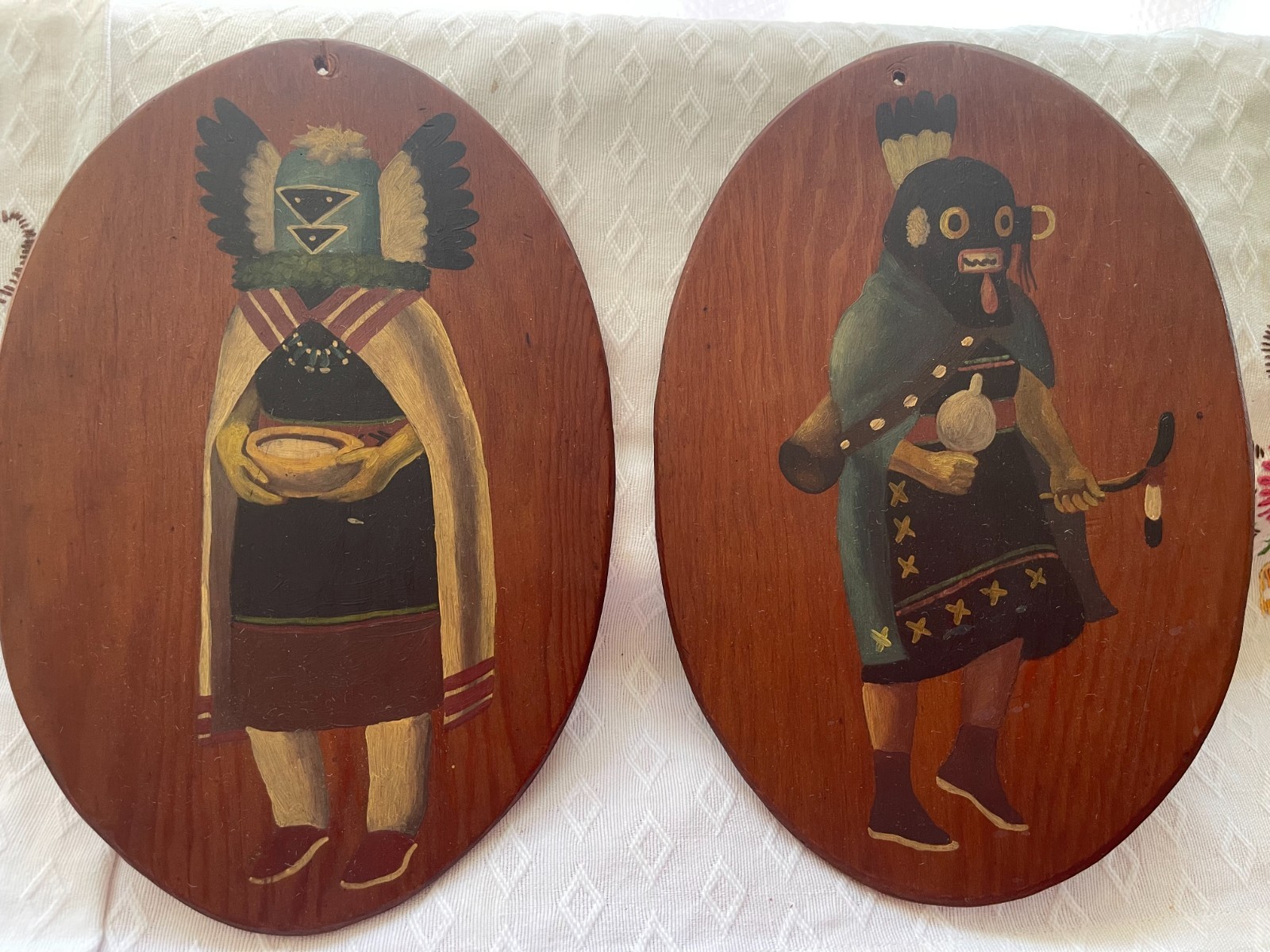Southwestern native American style hand-painted Kachina's on wood slabs Chavez?