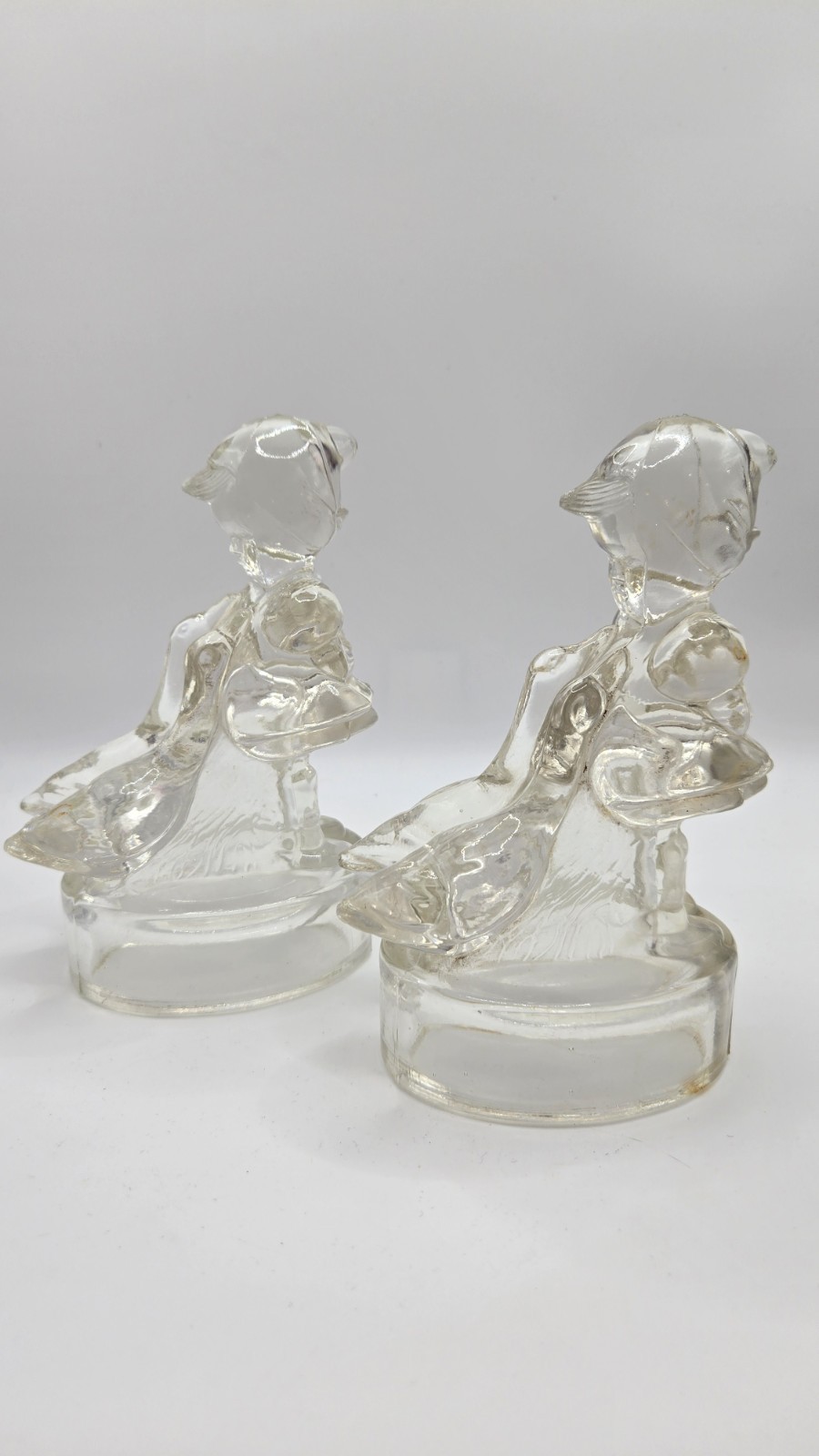 Vintage Clear Glass Girl Holding Goose Figurine Pair Hollow Base Insulator Style
