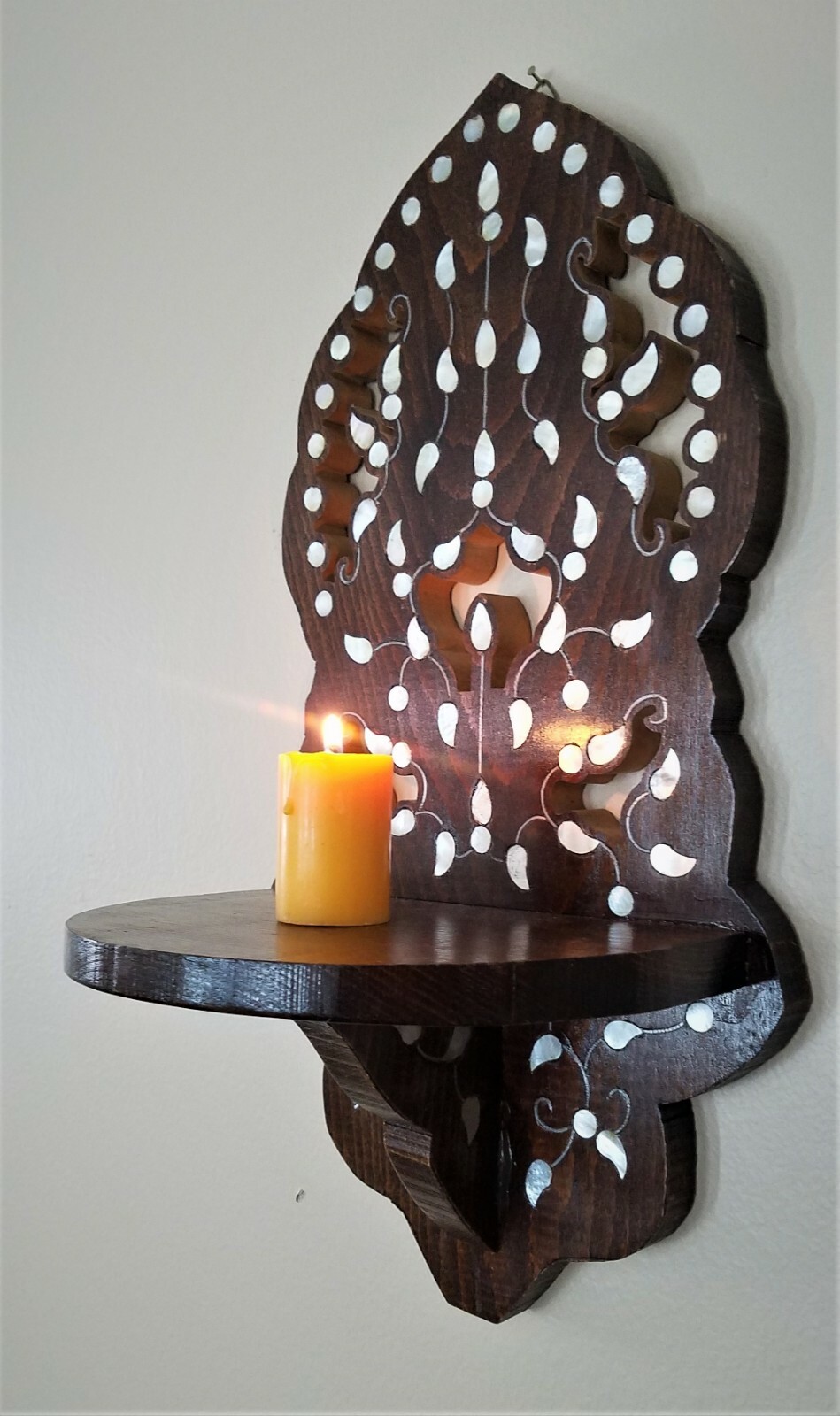 A Gorgeous wooden wall for hanging oil lamp or candles,moth mother of Pearl .