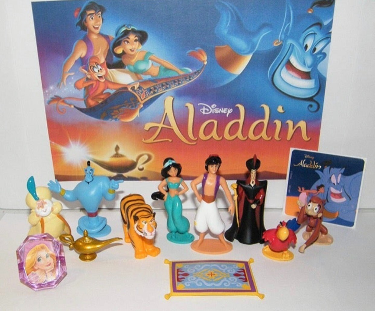 Disney Aladdin Deluxe Figure Set of 12 with Bonus Ring and Sticker Disney Aladdin Deluxe Figure Set of 12 with Bonus Ring and Sticker