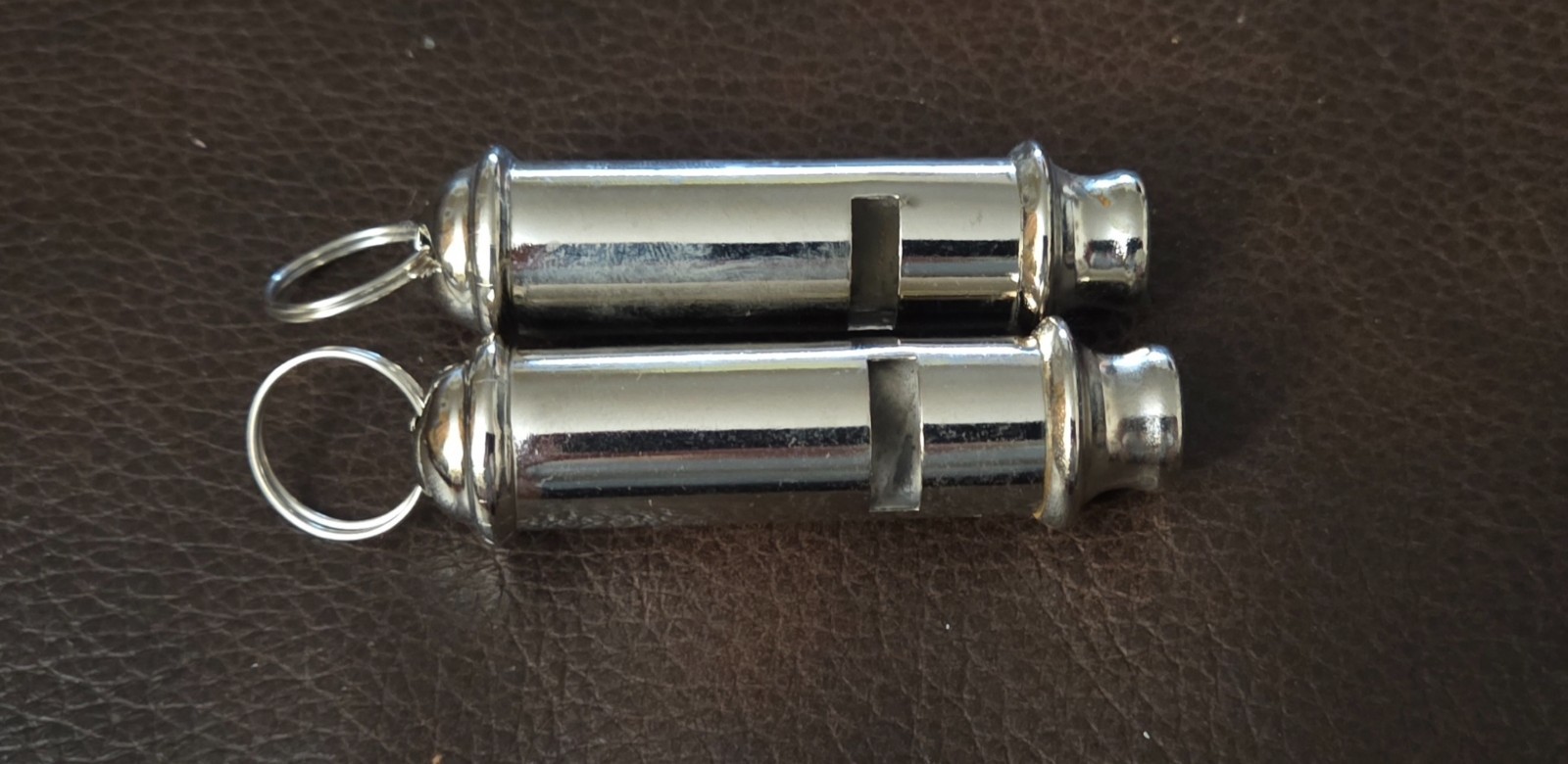 British Bobby Whistle Replica Chrome - Iconic Design (Pair) 2 1/2 X 7/8 inches British Bobby Whistle Replica Chrome - Iconic Design (Pair) 2 1/2 X 7/8 inches