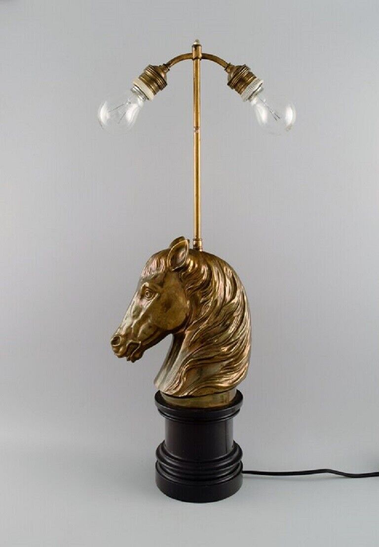 La Maison Charles, France. Large horse head table lamp in brass. Mid-20th c.
