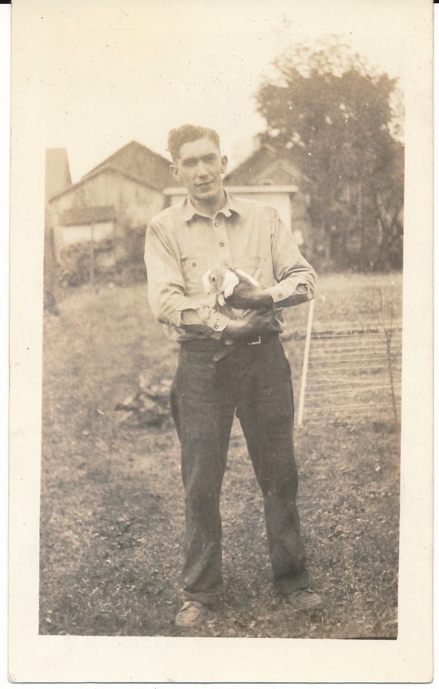 man holding cute little bunny rabbit 1930s vintage snapshot photo
