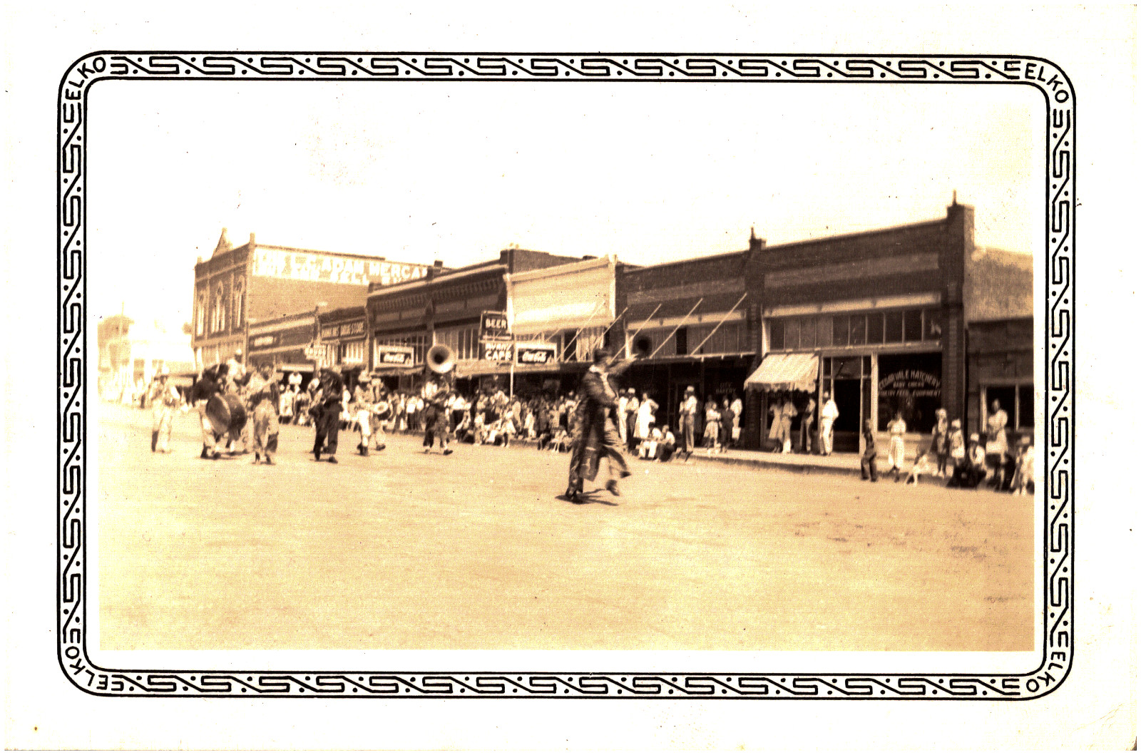 Parade in Cedar Vale Kansas L.C. Adam Mercantile Co. & Hatchery 1920s Photo