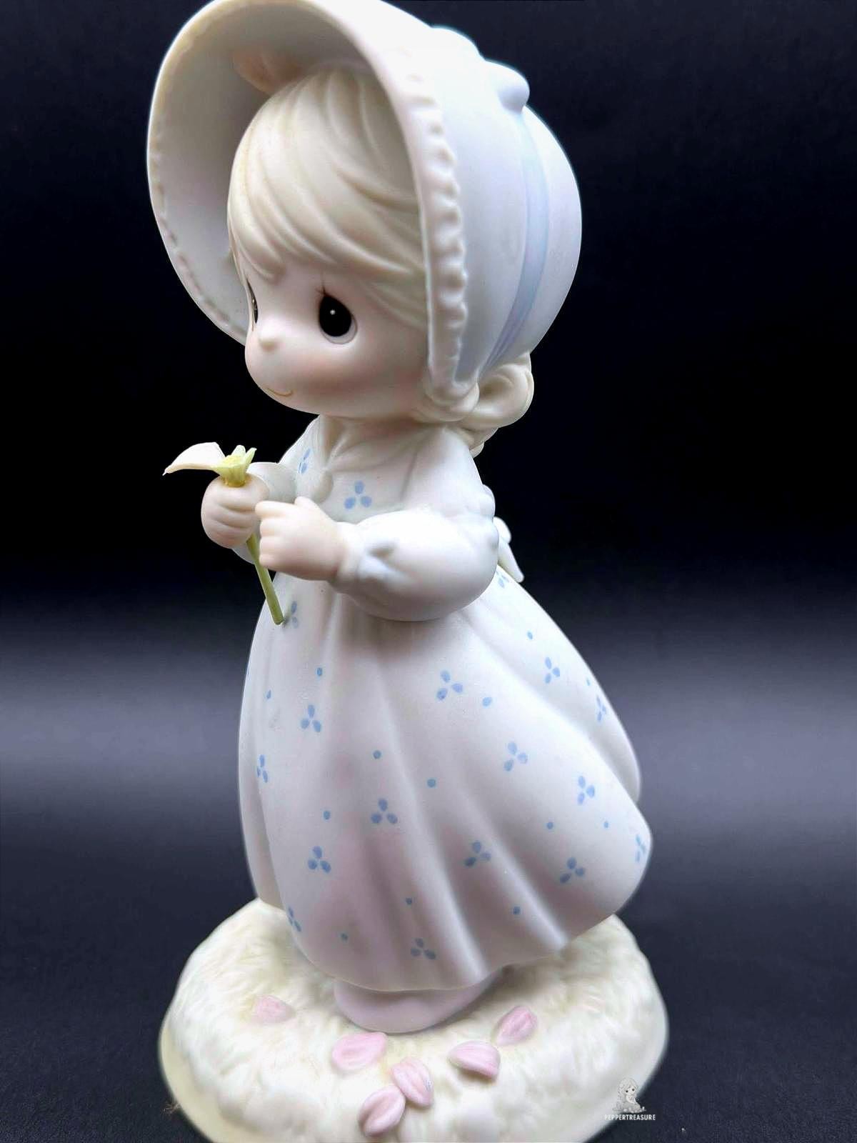Precious Moments Adorable Porcelain Figurine of a Girl with Flower