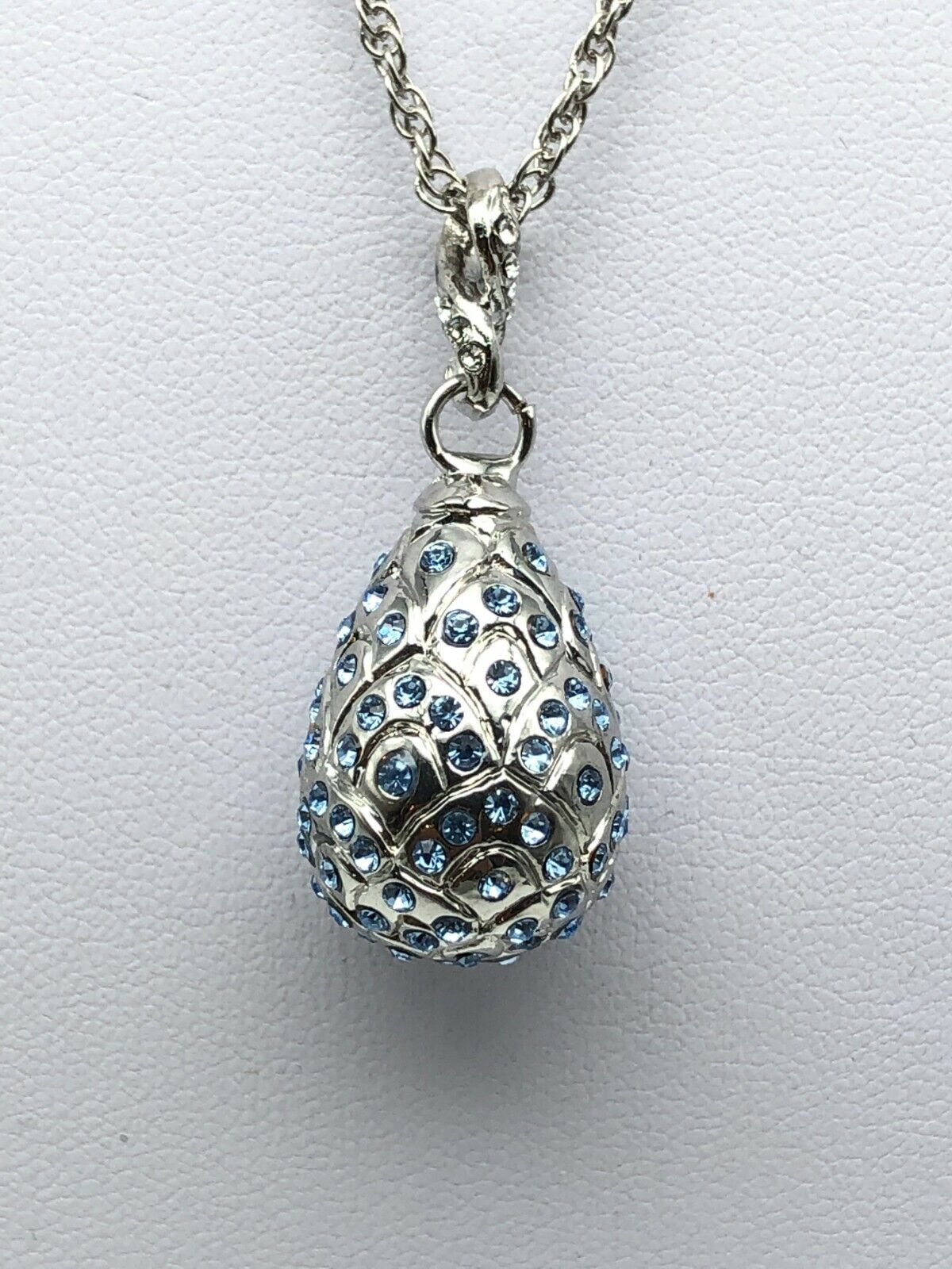 Silver and blue Egg Pendant Necklace with crystals by Keren Kopal