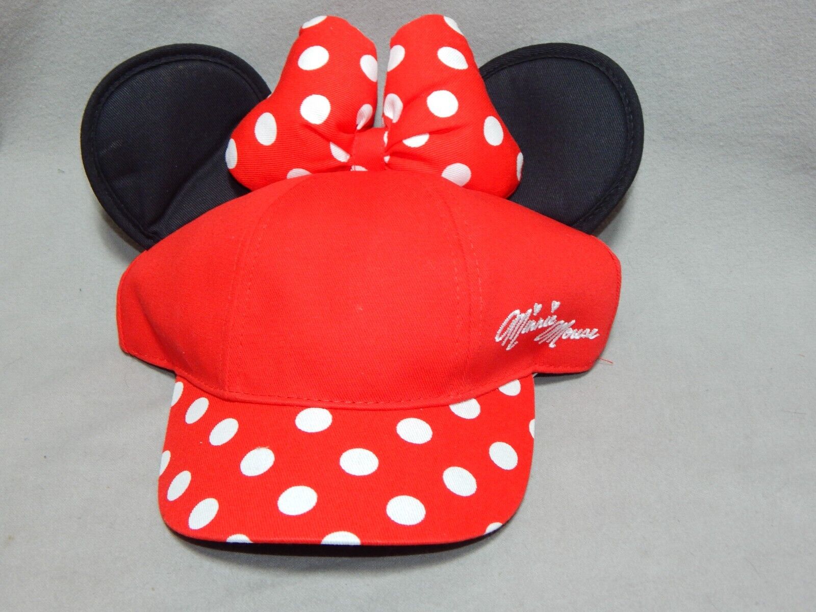 Genuine Disney Theme Park Minnie Mouse size youth red w/ white polka dot cap hat
