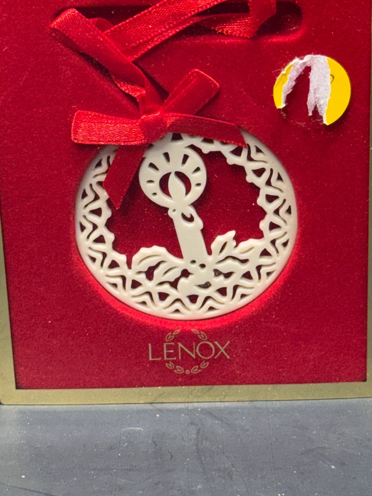 Lenox round white ornament with red ribbon Lenox round white ornament with red ribbon