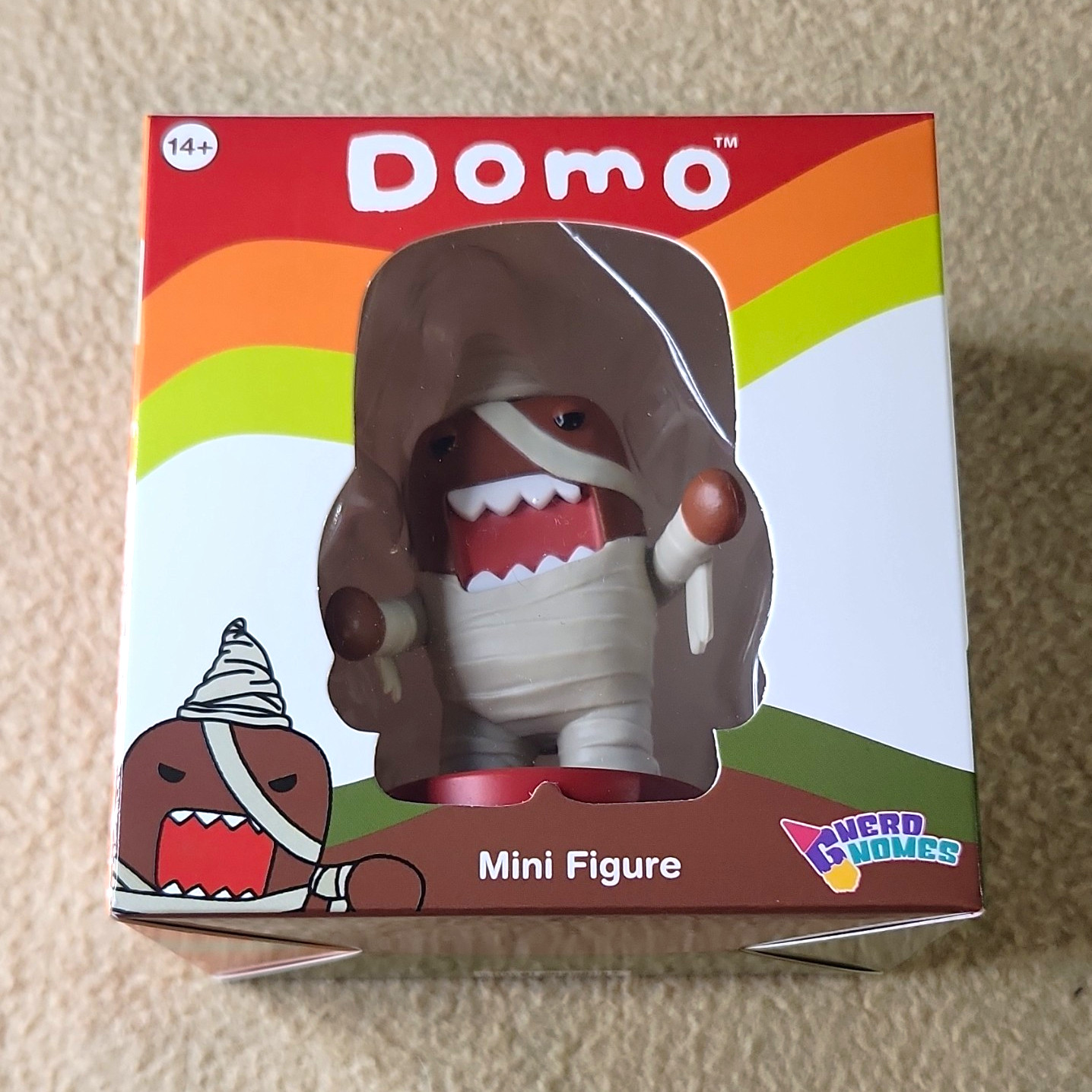 Nerd Nomes Domo Mini Figure Mummy Ground Stake Included MGNM-DOMO-MUMMY 14+ Nerd Nomes Domo Mini Figure Mummy Ground Stake Included MGNM-DOMO-MUMMY 14+