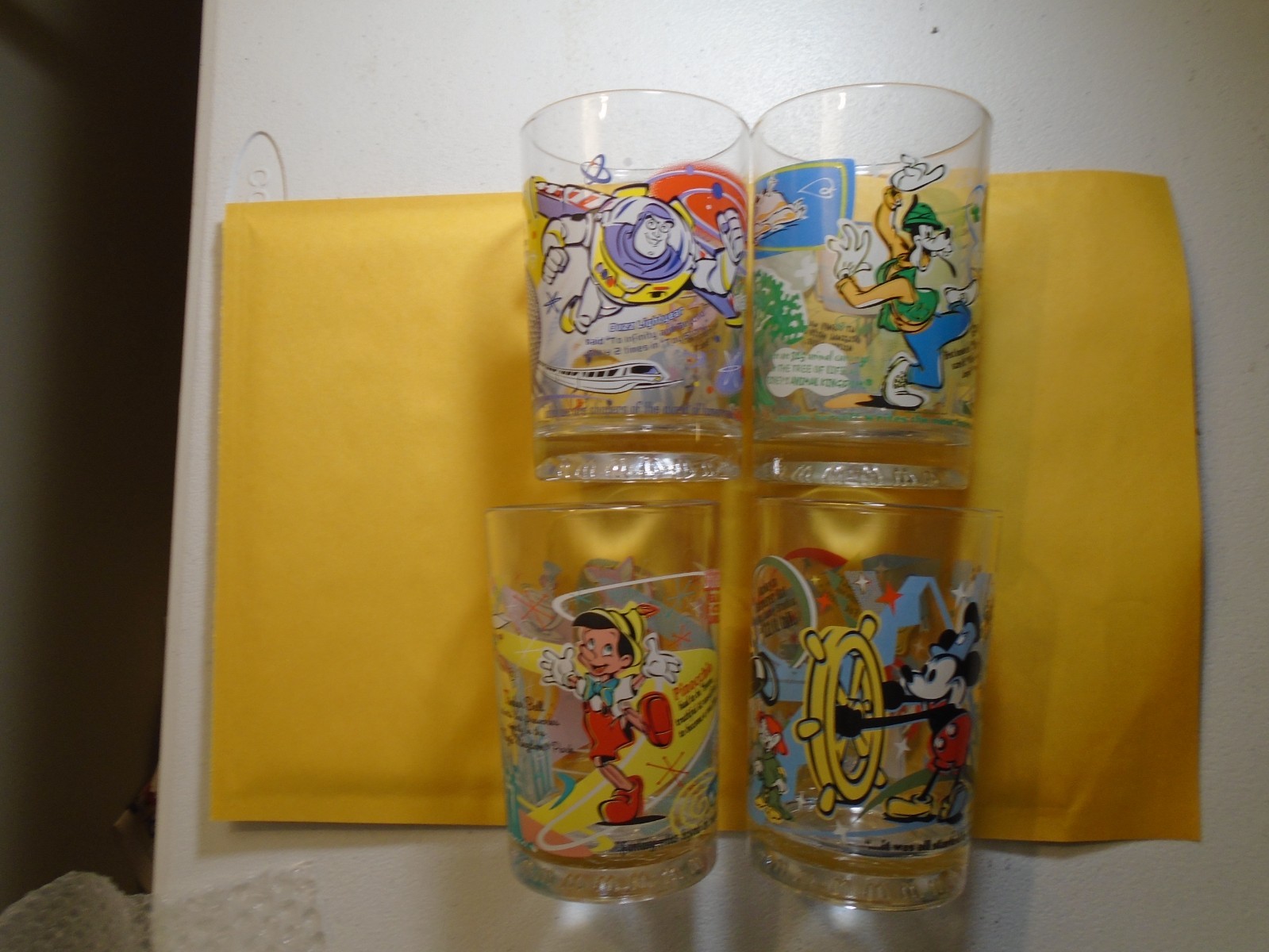MCDONALDS DISNEY 100 YEARS GLASSES SET OF 4 ( COMPLETE SET OF 4  ) 