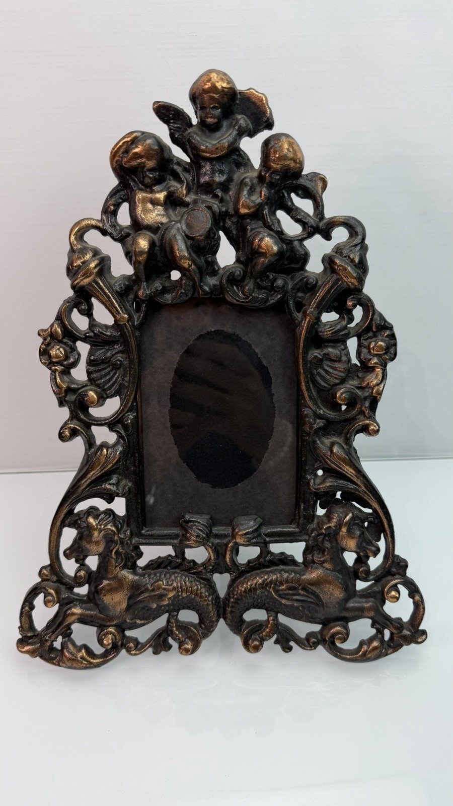 Late 19th Century Victorian Cast Iron Frame With Cupids and Mythical Animals
