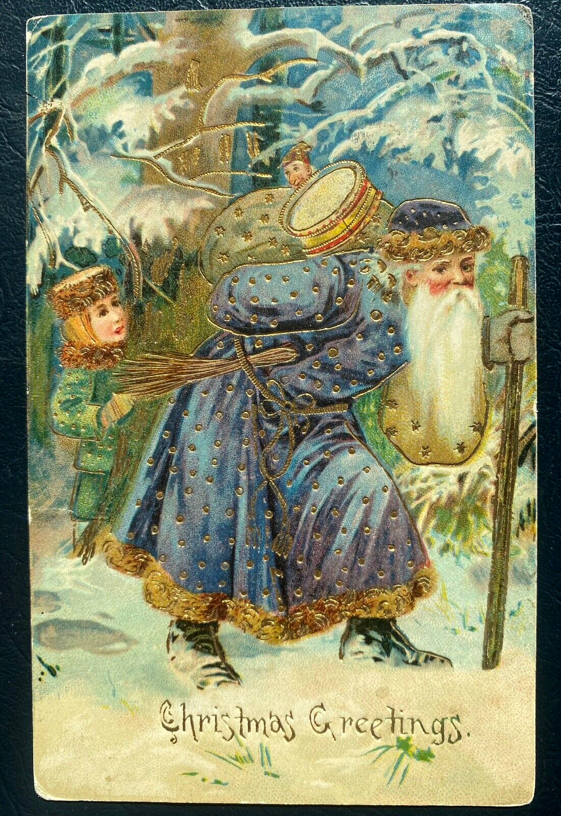 Fancy Blue Robe Santa Claus in Snow with Child~Toys~Christmas  Postcard ~k281