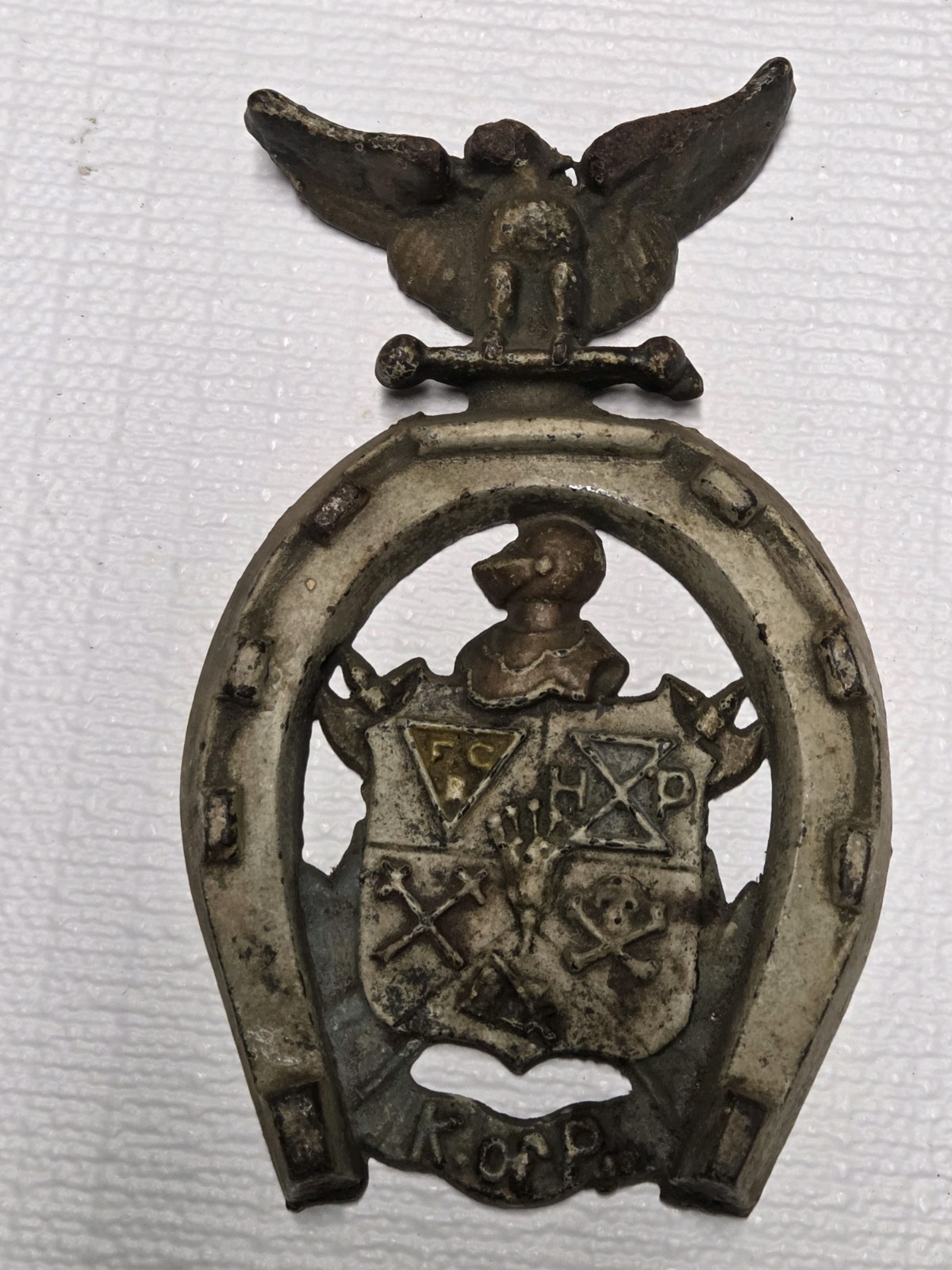 Antique horseshoe cast iron plaque, Knights of Pythias, emblem shield 