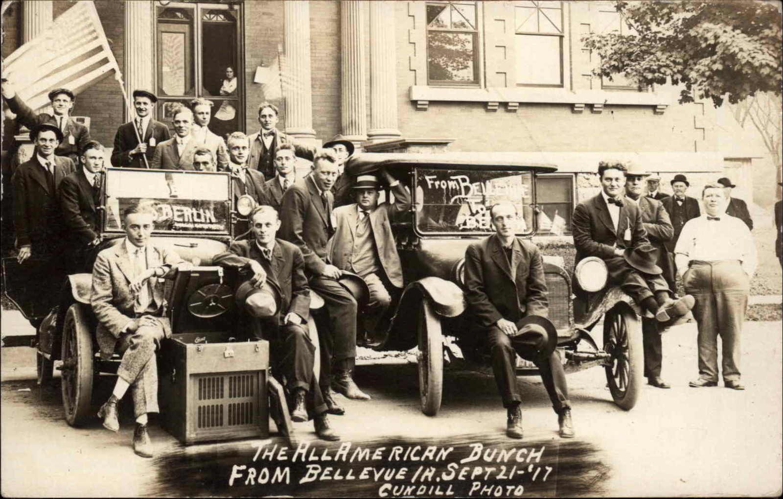 Bellevue Iowa IA Patriotic WWI Cars American Flag Men c1910s Real Photo Postcard
