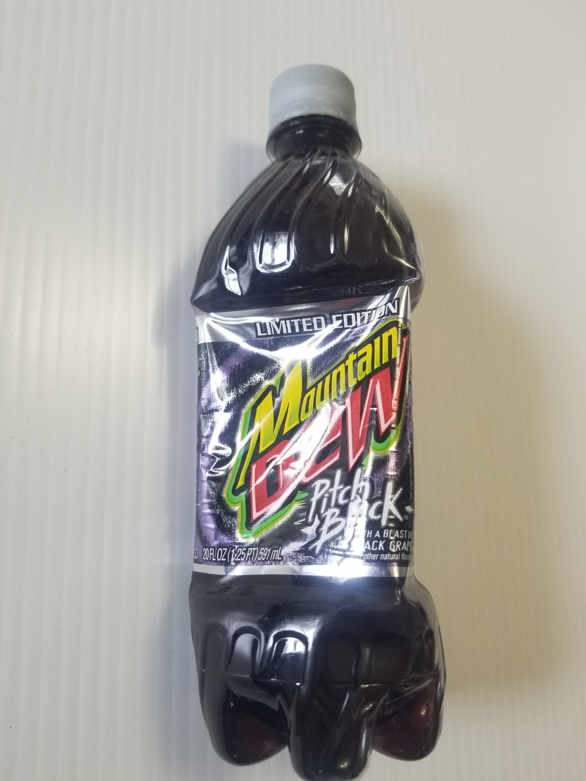 MOUNTAIN DEW PITCH BLACK 2004 Sealed Never Opened 20 oz Plastic Bottle NOS MOUNTAIN DEW PITCH BLACK 2004 Sealed Never Opened 20 oz Plastic Bottle NOS