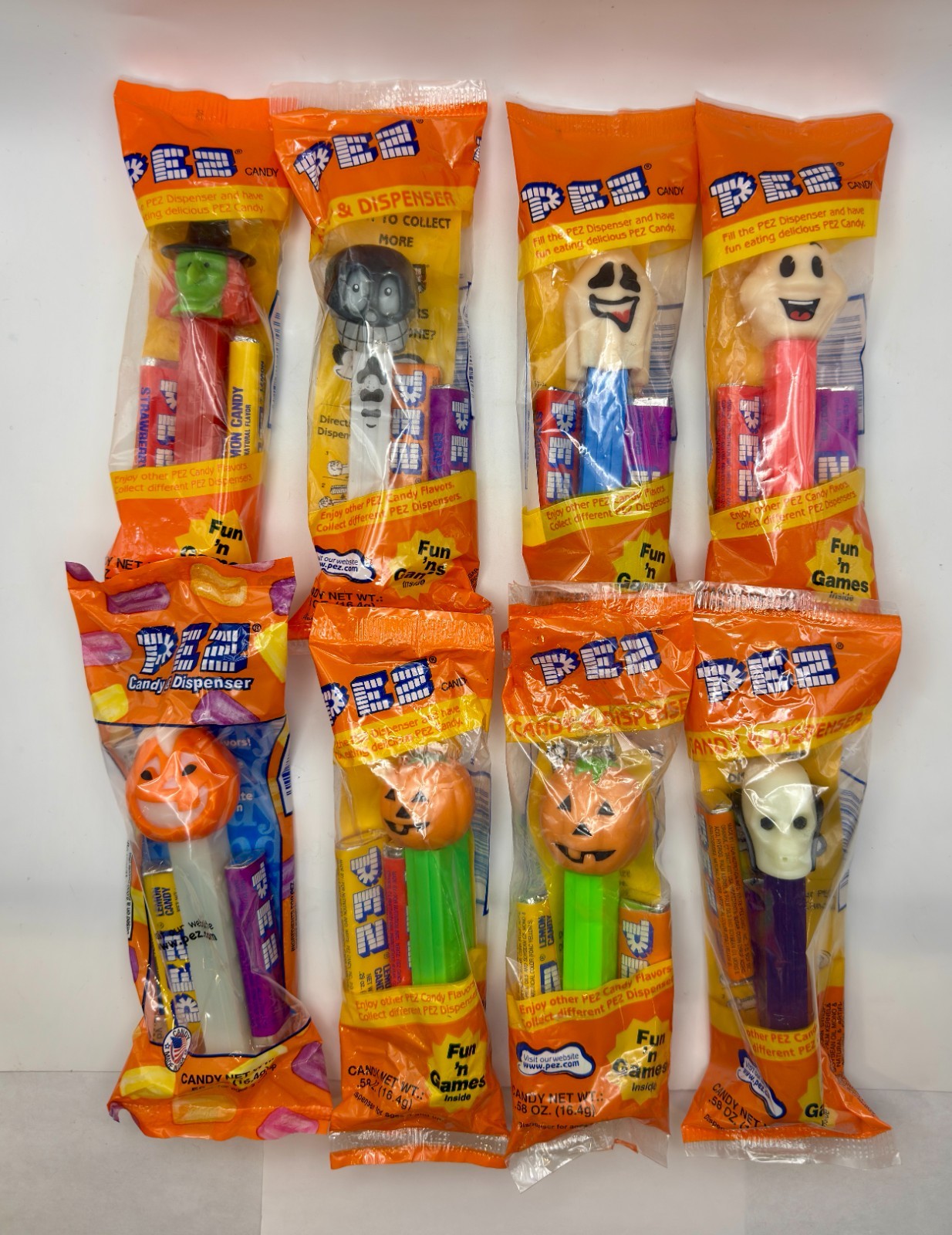 Lot of 8 Sealed Halloween PEZ Dispensers Witch Skull Ghosts Pumpkins New in Bags