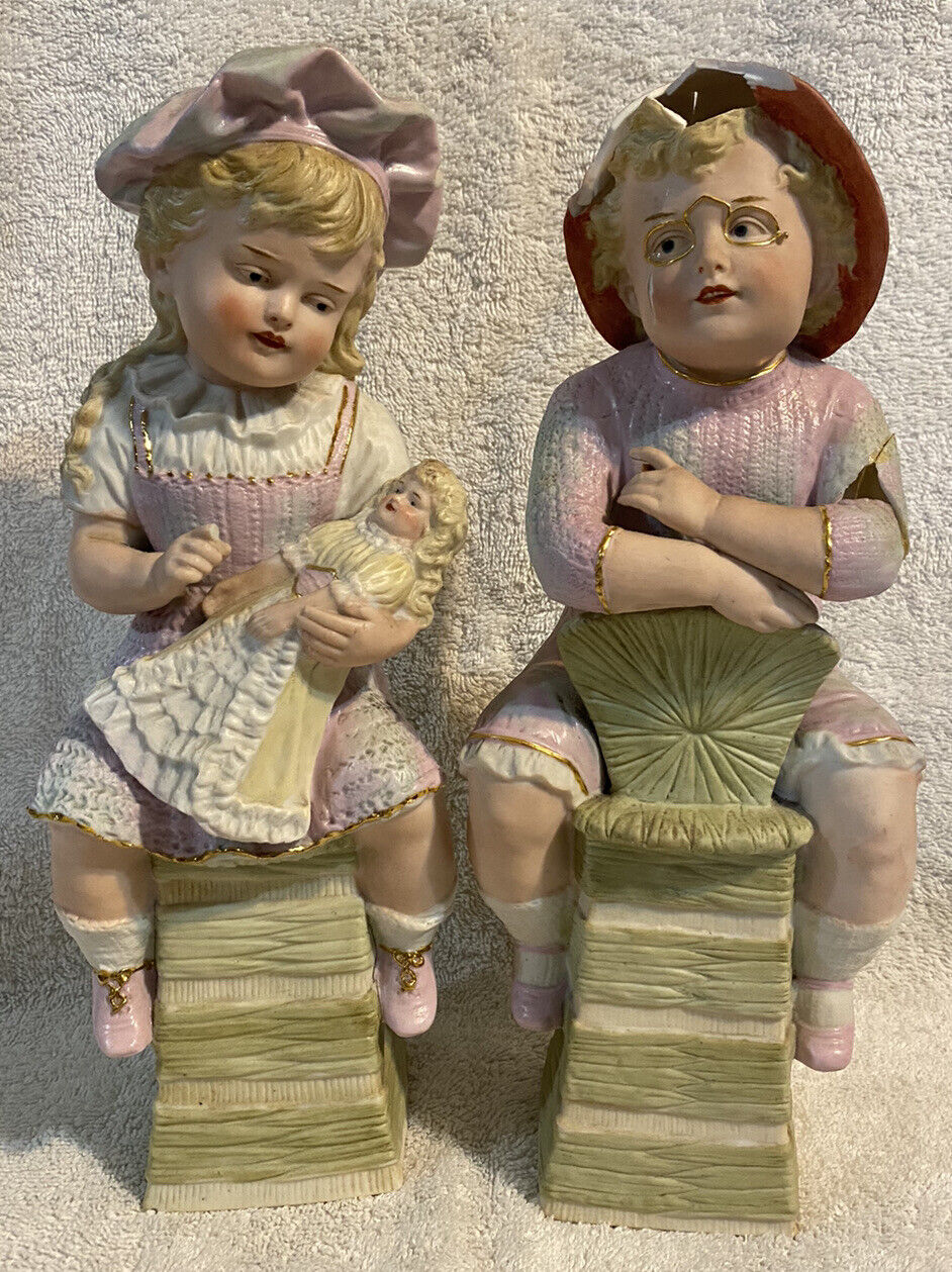 2 Vintage FIGURINES Gebruder Heubach Schutz Marke Bisque Germany Girl/doll 1900s