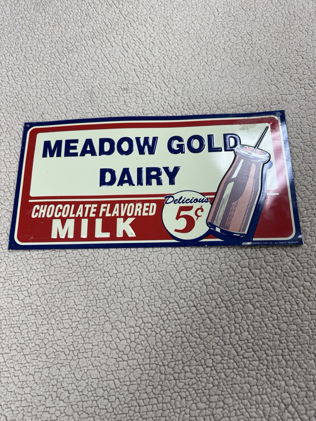 MCM Meadow Gold Dairy Chocolate Flavored Milk Embossed Metal Sign 15