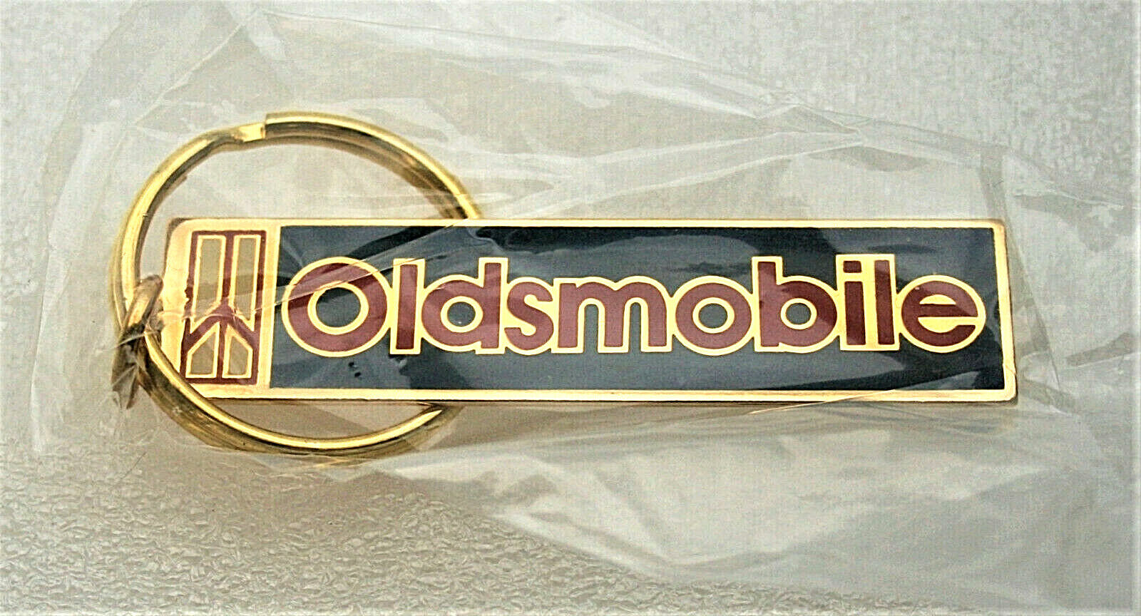 Vintage Oldsmobile Olds Rocket Brass Car Logo Key Chain 1970's NOS New Unopened