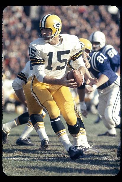 Bart Starr of Green Bay Packers drops back pass against Baltimore - Old Photo