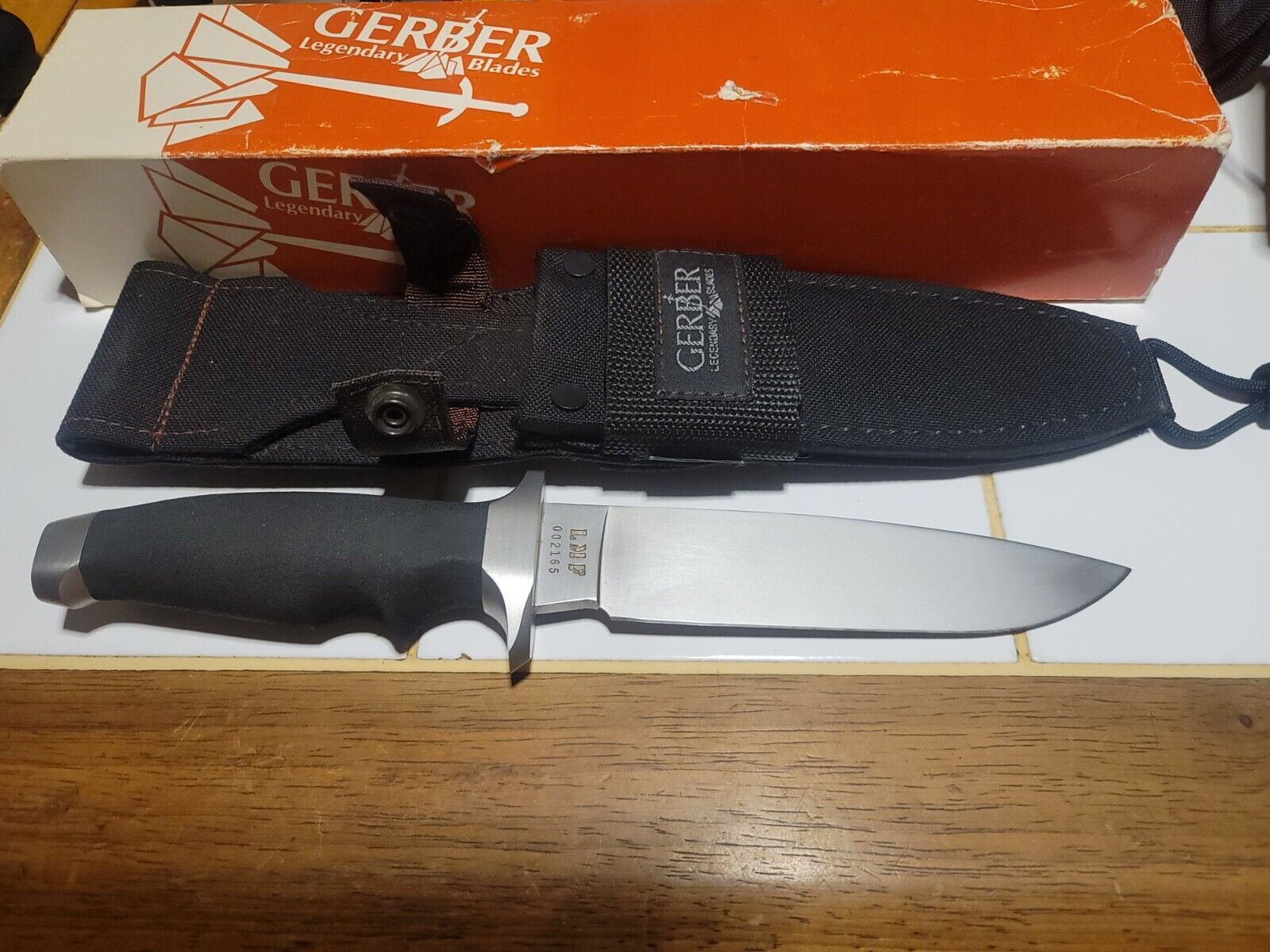 GERBER USA LMF SURVIVAL KNIFE WITH SHEATH AND PAPERWORK NEW IN THE BOX RARE